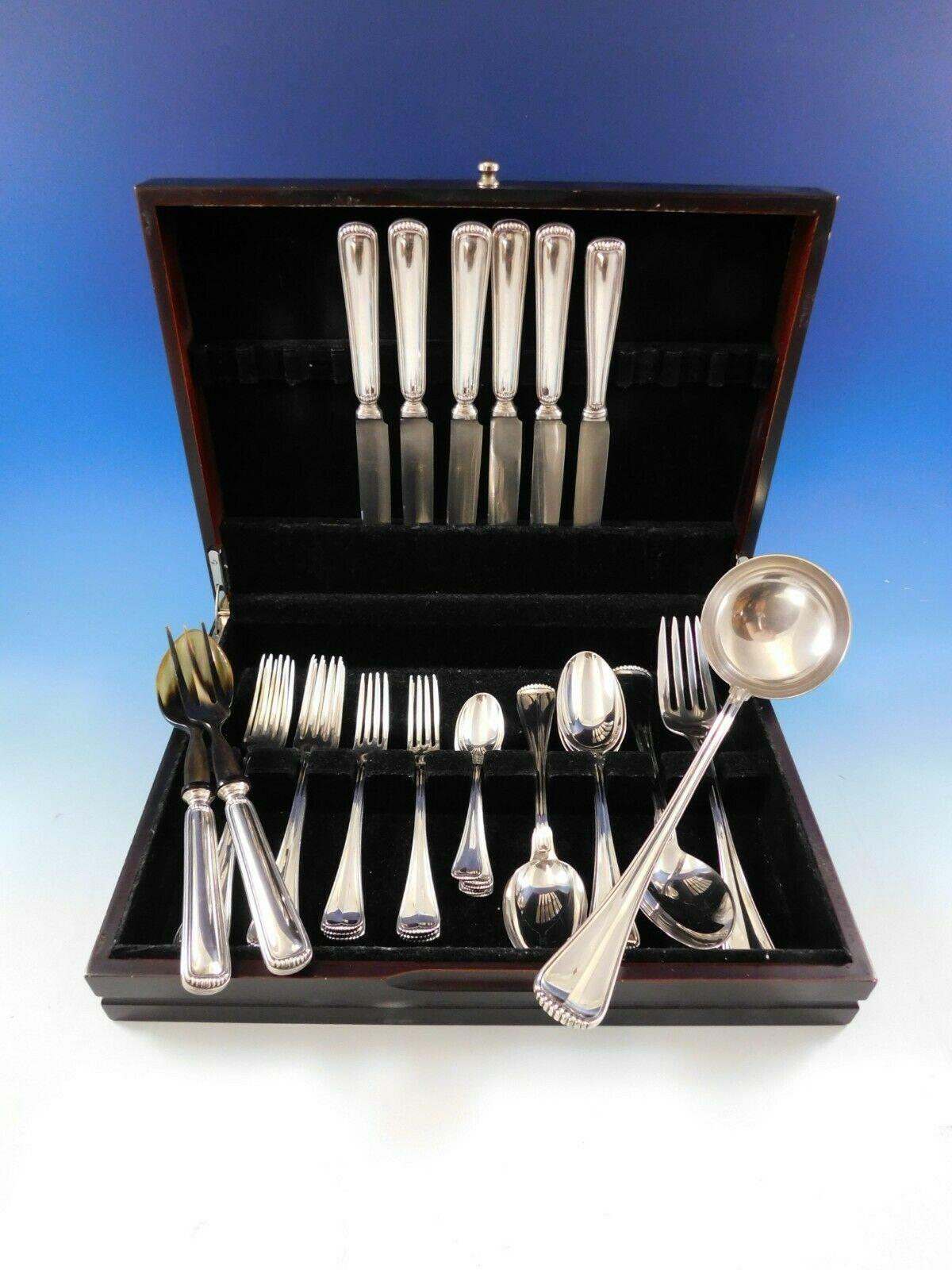 Milano by Clementi/Buccellati Italy Dinner size 800 silver Flatware set, 35 pieces. This set includes:

6 dinner knives, (5 measure 9 7/8