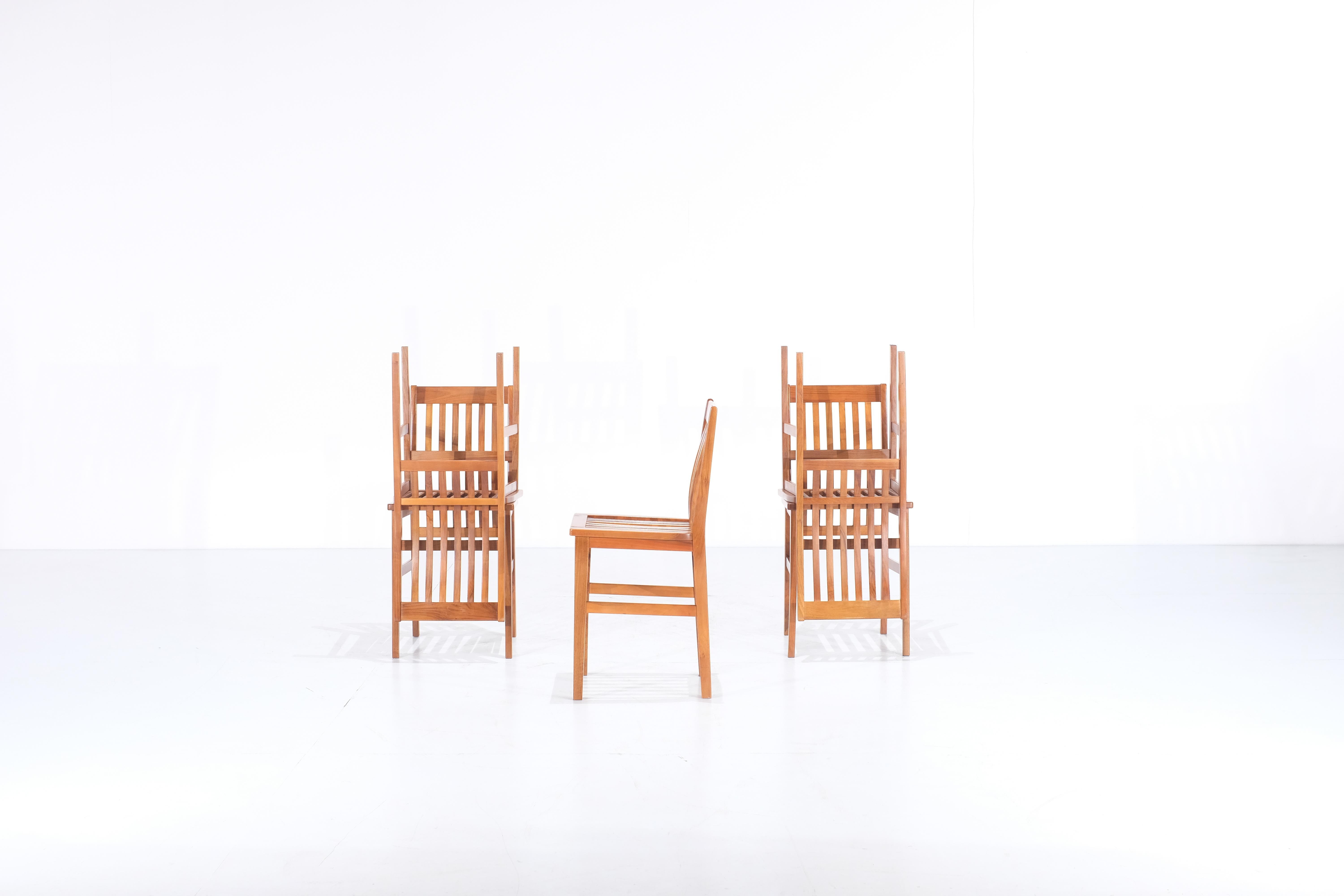 Amazing  set of five Milano chairs designed in 1987 by Aldo Rossi for Molteni. 
These chairs are very rare because they are no longer produced. This model is also exhibited in the permanent collection of the Molteni Museum. 
 With its practical and