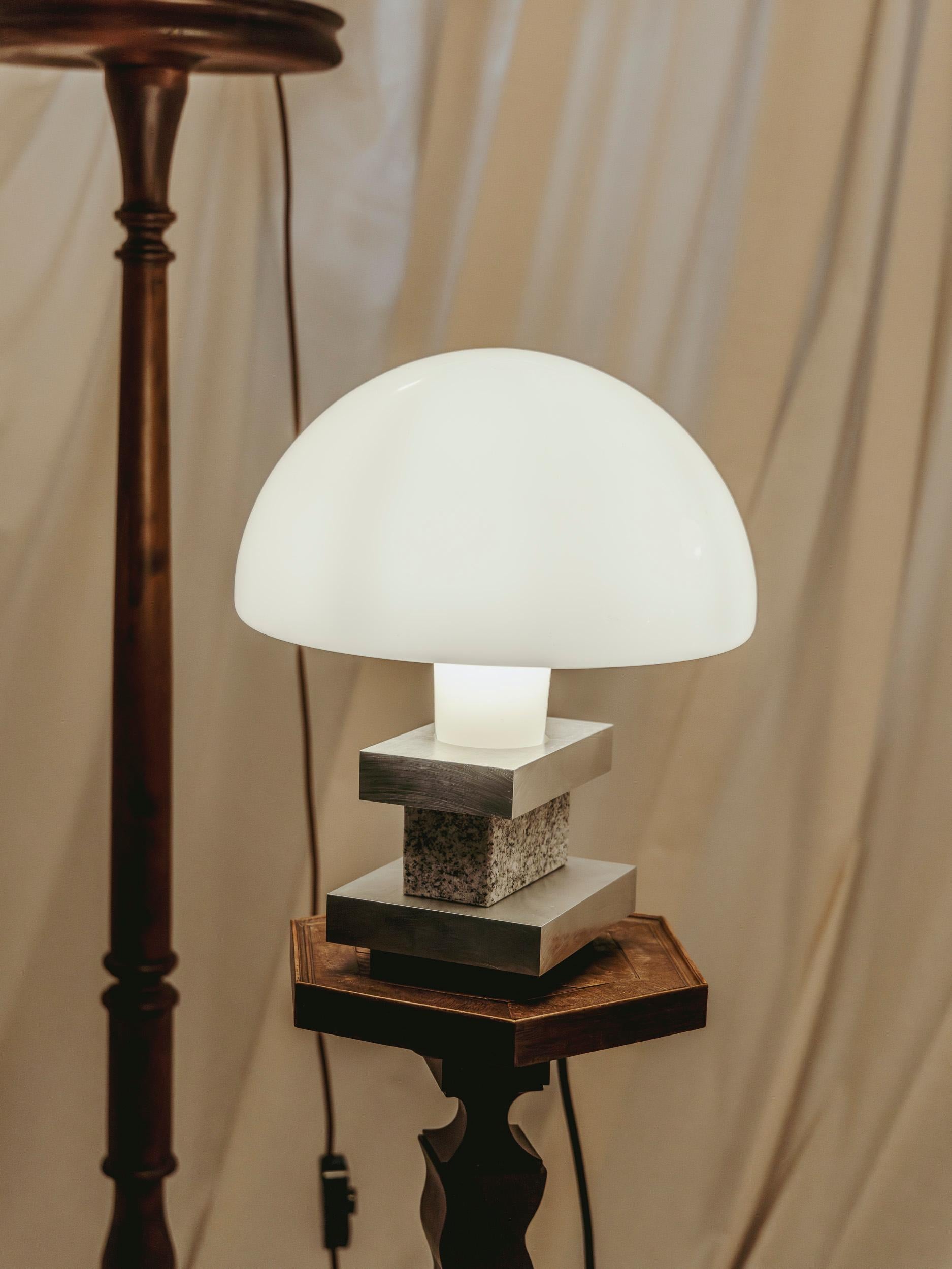 TABLE LAMP MILANO - Limited Borsani Edition 1/7 - No. 3

The new table lamp MILANO by Fabian Freytag Studio is a fascinating example of how artificial intelligence and traditional craftsmanship can harmoniously collaborate. The design of the lamp