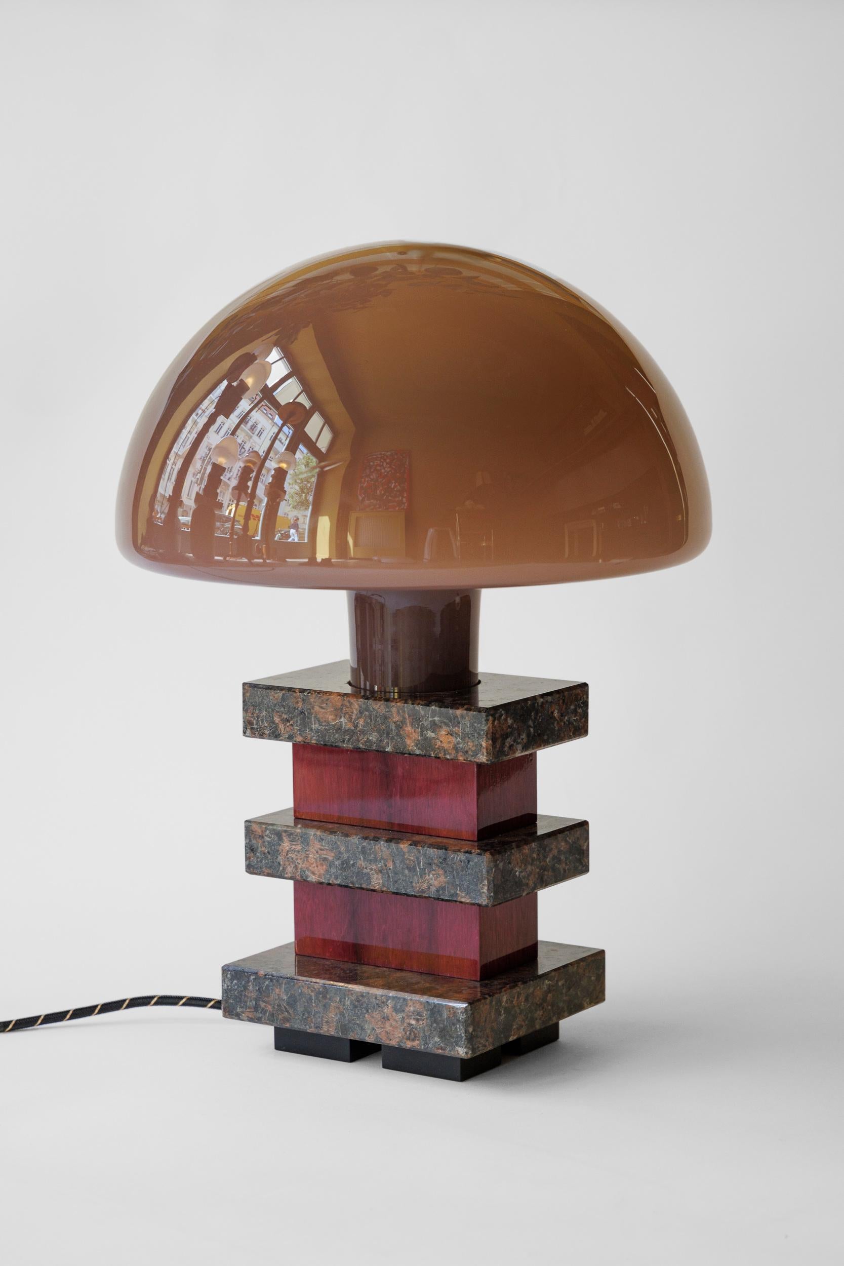 TABLE LAMP MILANO - Limited Borsani Edition 1/7 - No.6

The new table lamp MILANO by Fabian Freytag Studio is a fascinating example of how artificial intelligence and traditional craftsmanship can harmoniously collaborate. The design of the lamp