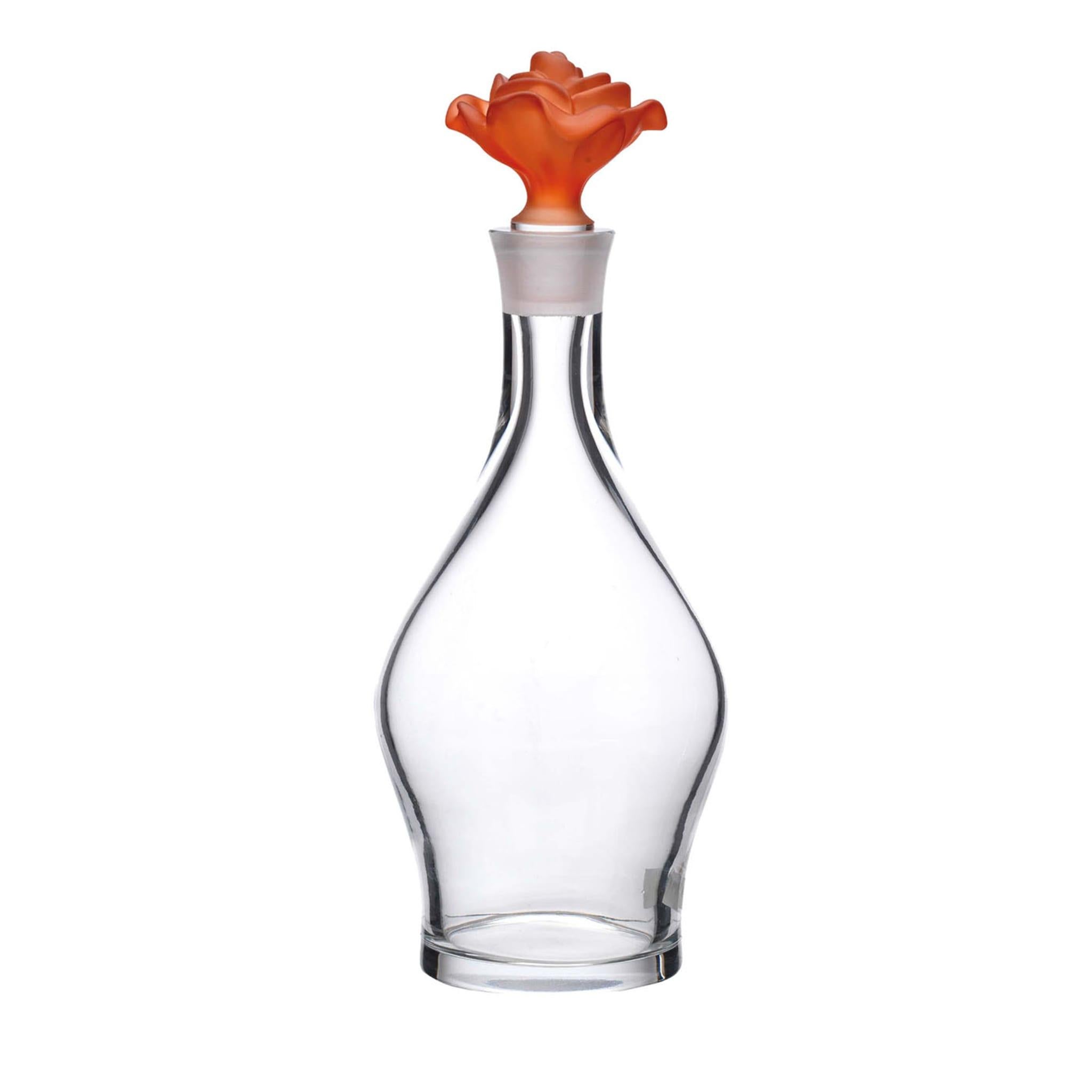 Mouth-blown from fine crystal, this transparent bottle from the Milano Collection stands out for its unmistakable femininity. The sensual curves of its silhouette stand in impeccable harmony with the opaline orange lid in the shape of a blossoming