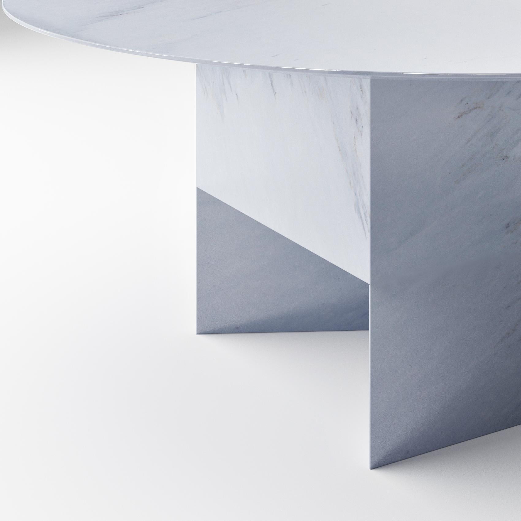 Mild difference marble table by Scattered Disc Objects

Material: Carrara marble or bardiglio marble
Specs: Table top thickness = 3cm, with safety nylon net
Dimensions: Diameter 160 cm, height 73cm
Handmade in Italy

Available in Size and