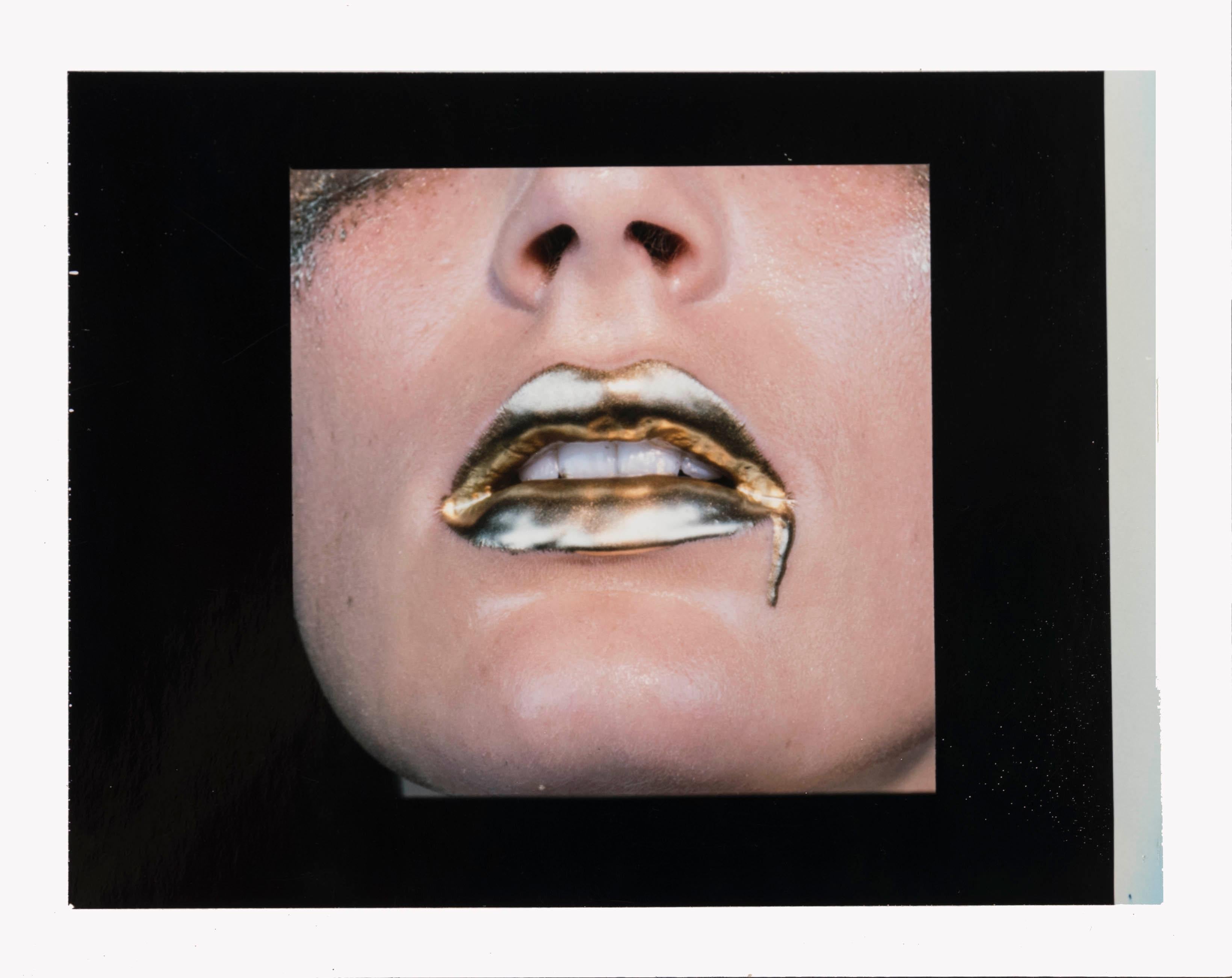Bold Gold - study IV 2006 - Miles Aldridge (Colour Photography)
Unique Polaroid print
Signed in ink on reverse
3 1/2 x 4 1/4 inches

Miles Aldridge (born 1964) is one of Britain’s most celebrated fashion photographers, who has worked for a number of