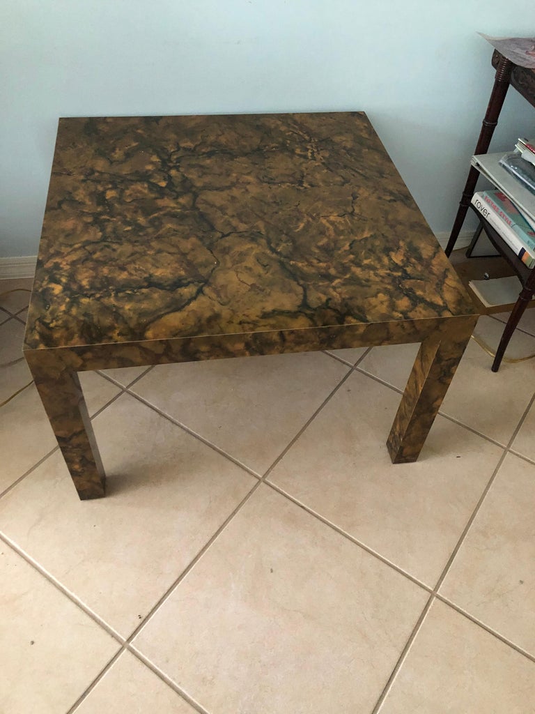 Fabulous burl parsons coffee table designed by Miles Baughman for the Thayer Coggin company. Marked and dated underneath. These are getting harder to find in very good condition. Measures: 20 3/8 inches high by 32 1/8 wide and deep. Local Palm Beach