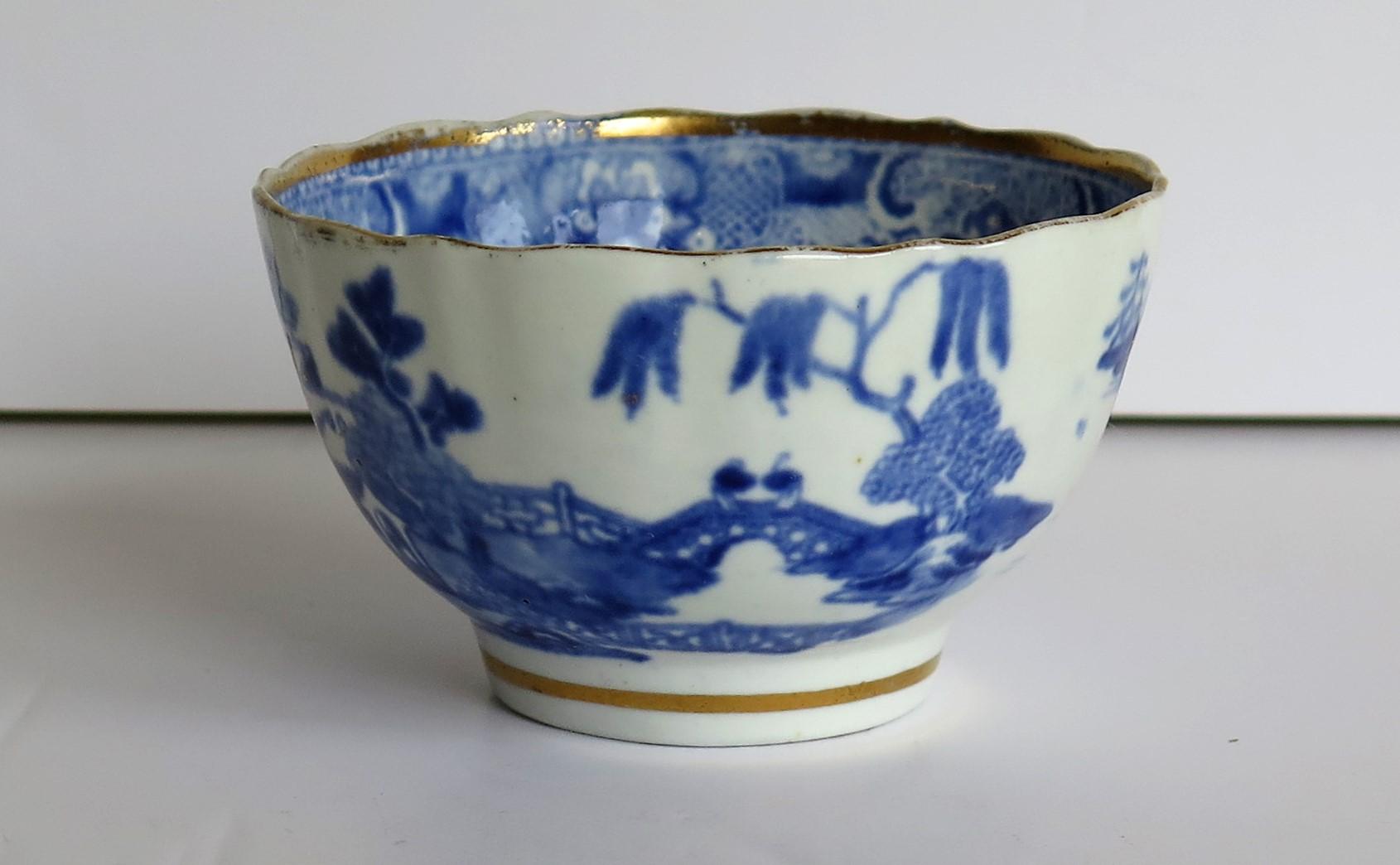 This is a porcelain bowl made by Miles Mason (Mason's), Staffordshire Potteries, England around the turn of the 18th century, circa 1805. 

The Tea bowl is well potted on a low foot with vertical fluting to the body, having two broad and one