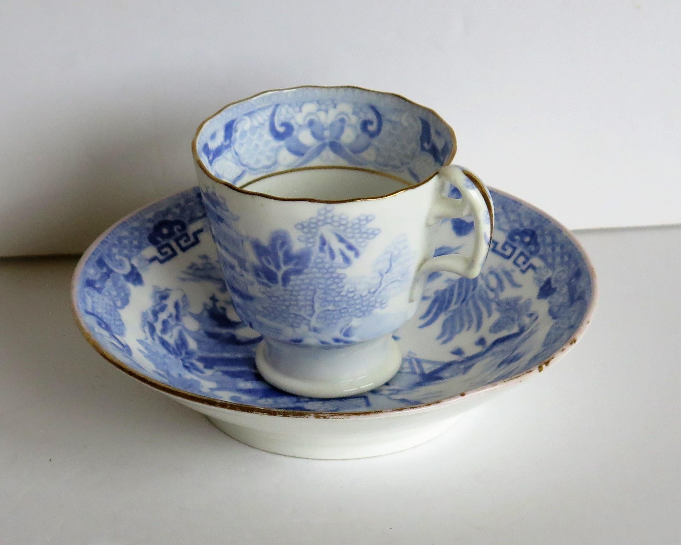 This is a porcelain blue and white, hand gilded coffee cup and saucer made by Miles Mason (Mason's), Staffordshire Potteries, in the early 19th century, circa 1812-1820.

Both pieces are well potted with the cup having the 