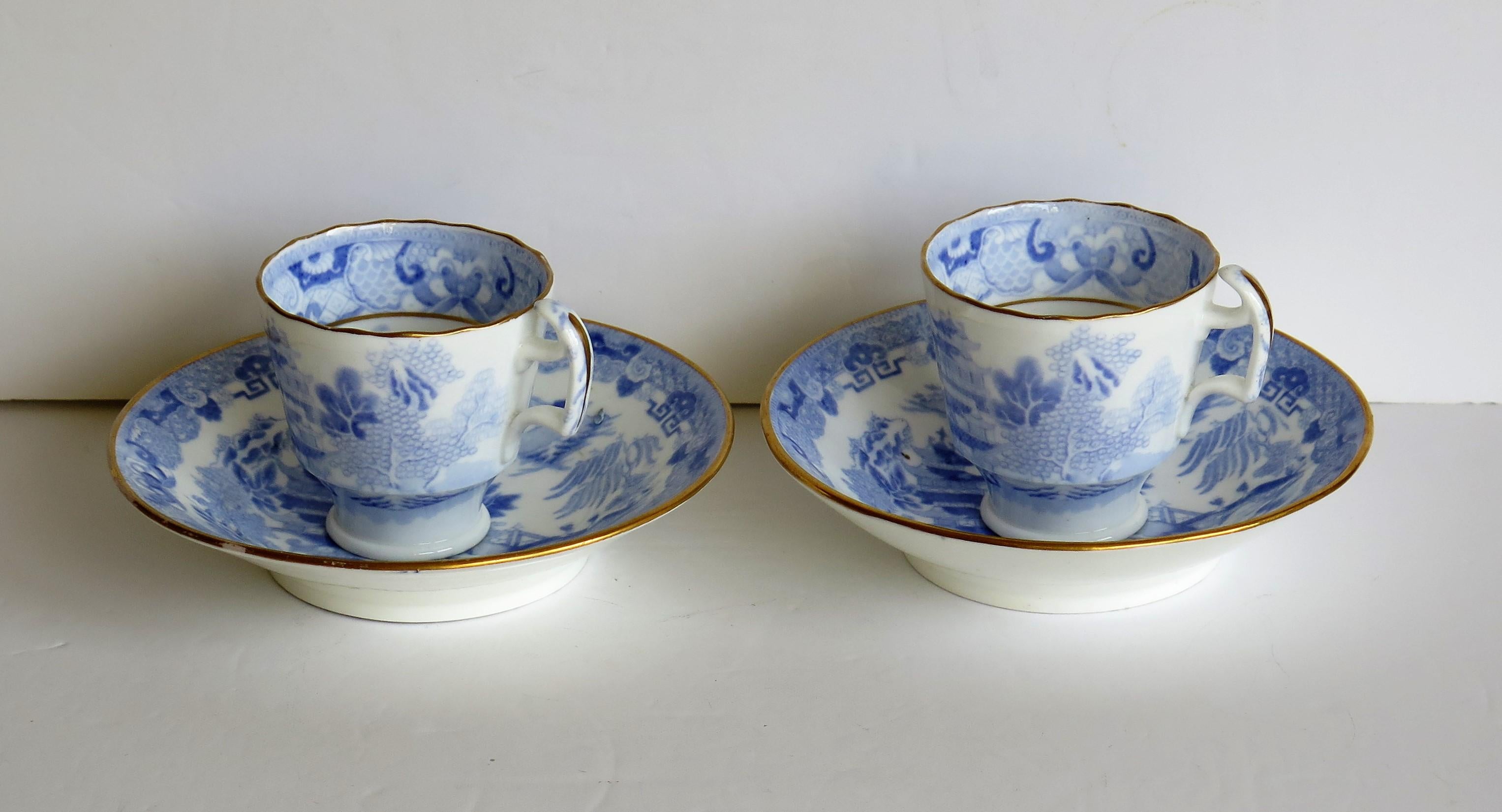 This is a porcelain blue and white, hand gilded pair of coffee cups and saucers made by Miles Mason (Mason's), Staffordshire Potteries, in the early 19th century, circa 1812-1820.

All pieces are well potted with the cups having the 