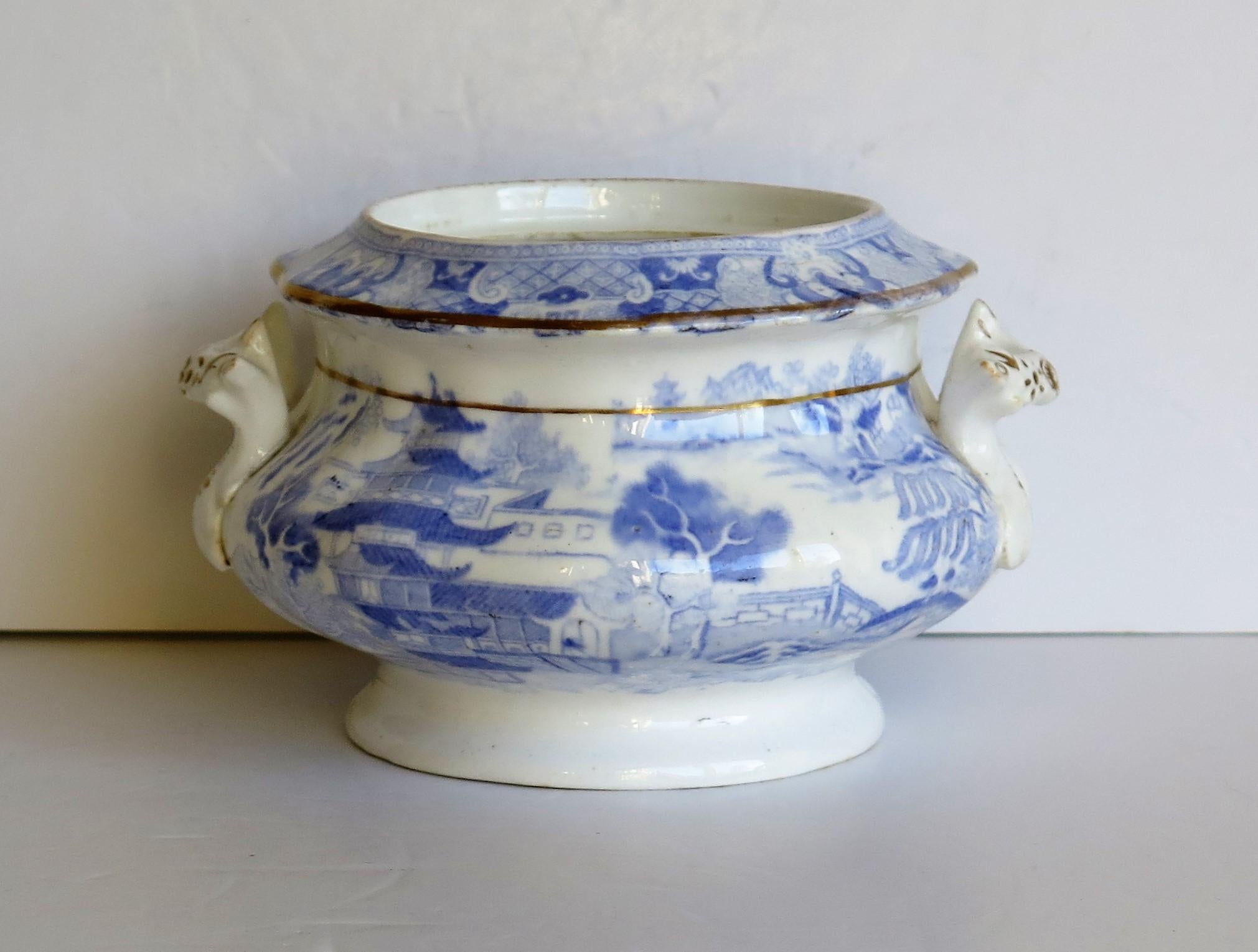 This is a porcelain blue and white, hand gilded Sucrier (Sugar Bowl) in the Broseley printed pattern made by Miles Mason (Mason's), Staffordshire Potteries, in the early 19th century, circa 1810.

This piece is well potted with a lovely shape and