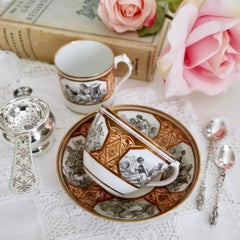 Miles Mason Porcelain Teacup Trio, Minerva and Cherubs, Bronze, Regency ca 1810