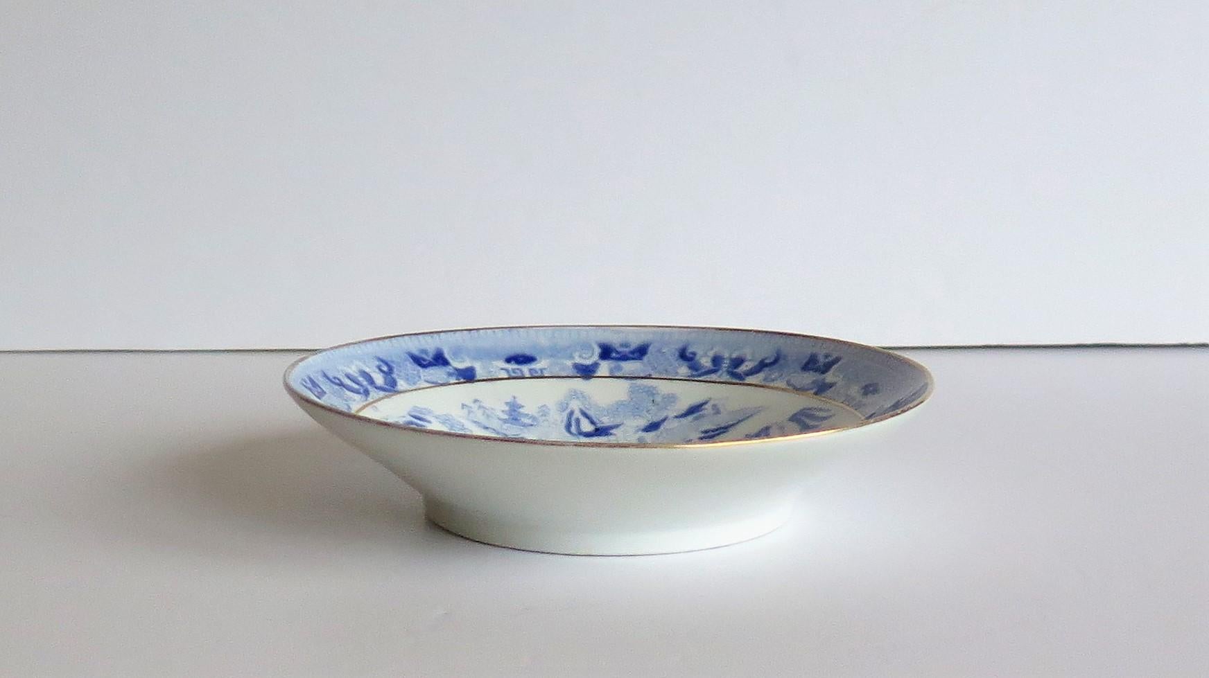 English Miles Mason Porcelain Trio Blue and White Broseley Willow Pattern, circa 1815