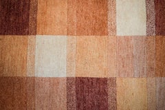 Milford, Sweden, pure wool rug. Geometric fields in red, orange and white shades