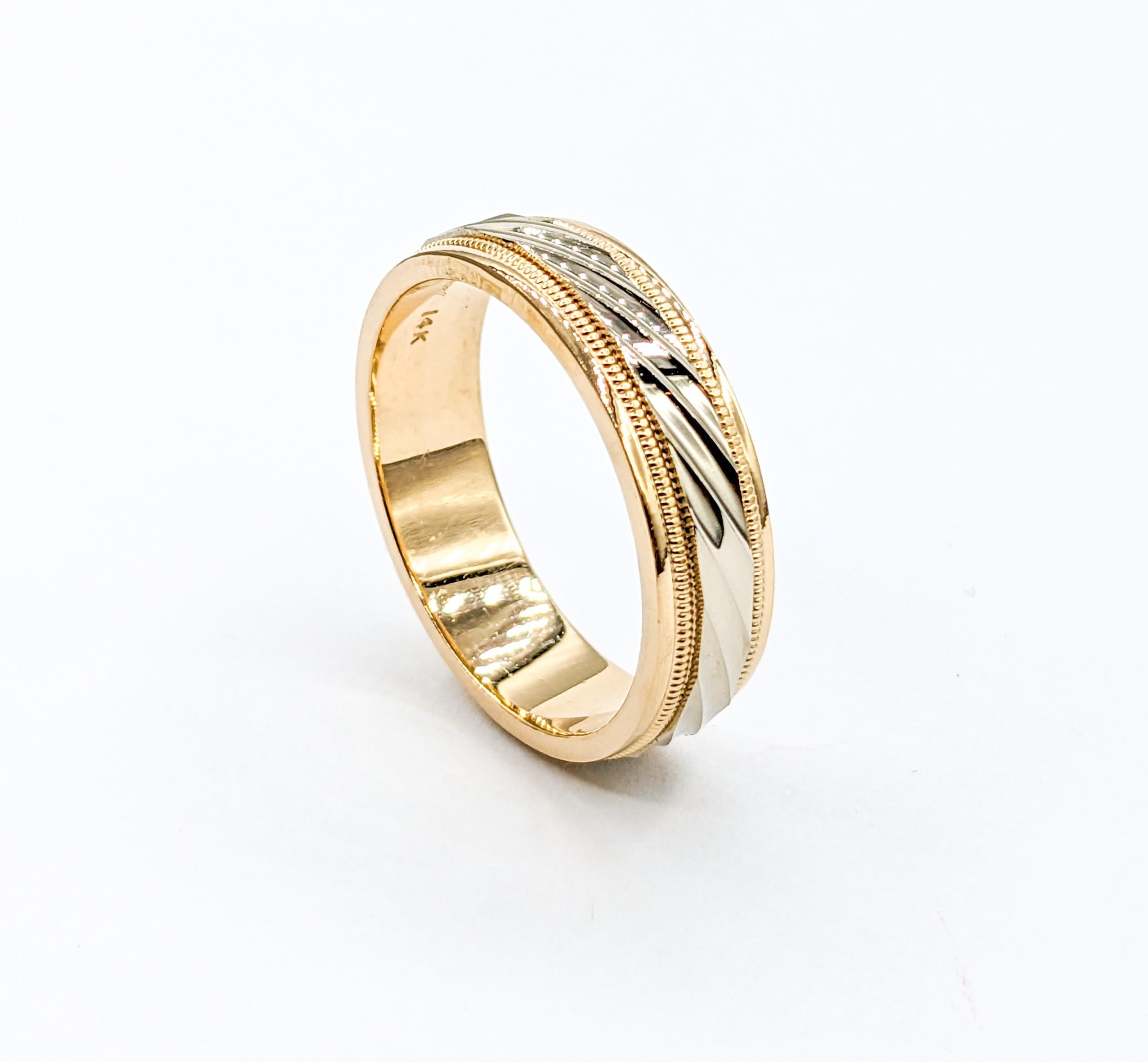Milgrain Stripped Men's Ring Yellow Gold

Discover the allure of this exquisite ring, meticulously crafted in 14 karat two tone (White and yellow gold). It features a stunning Milgrain Stripe design, measuring 6.9 mm wide, that radiates timeless