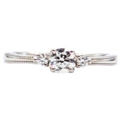 Milgrain Three-Stone Diamond Ring in Platinum