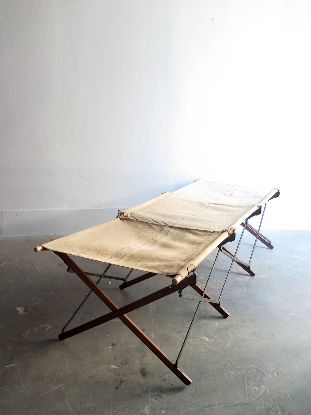 Military foldable wooden and canvas bed.