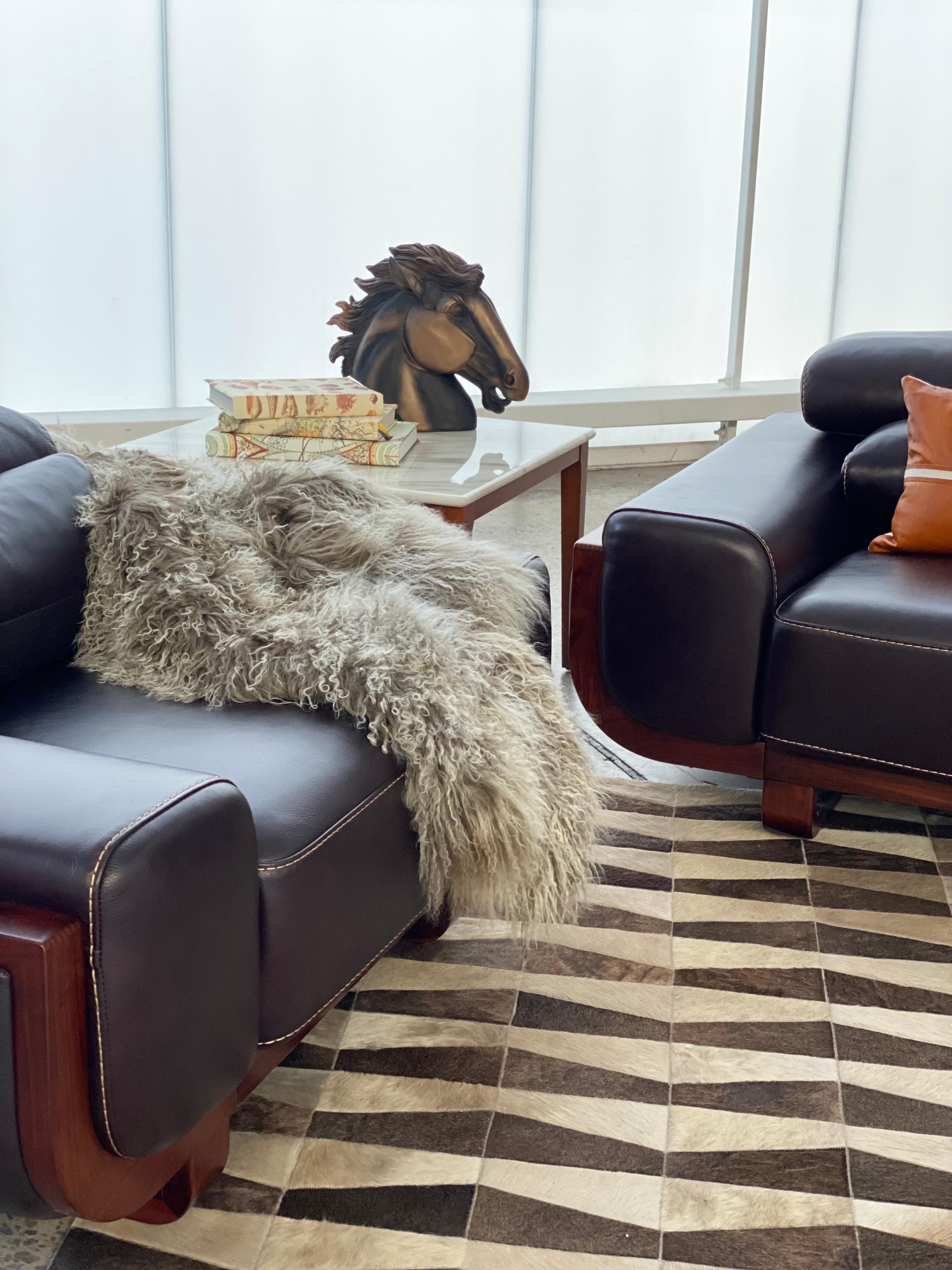 Limited edition, Mongolian fur throw, handcrafted in Australia from exquisite Mongolian sheepskin. The two-tone wool features a deep olive green with contrast-dyed wool tips, creating a beautiful shuffle of color tones. 

Mongolian wool has a silky