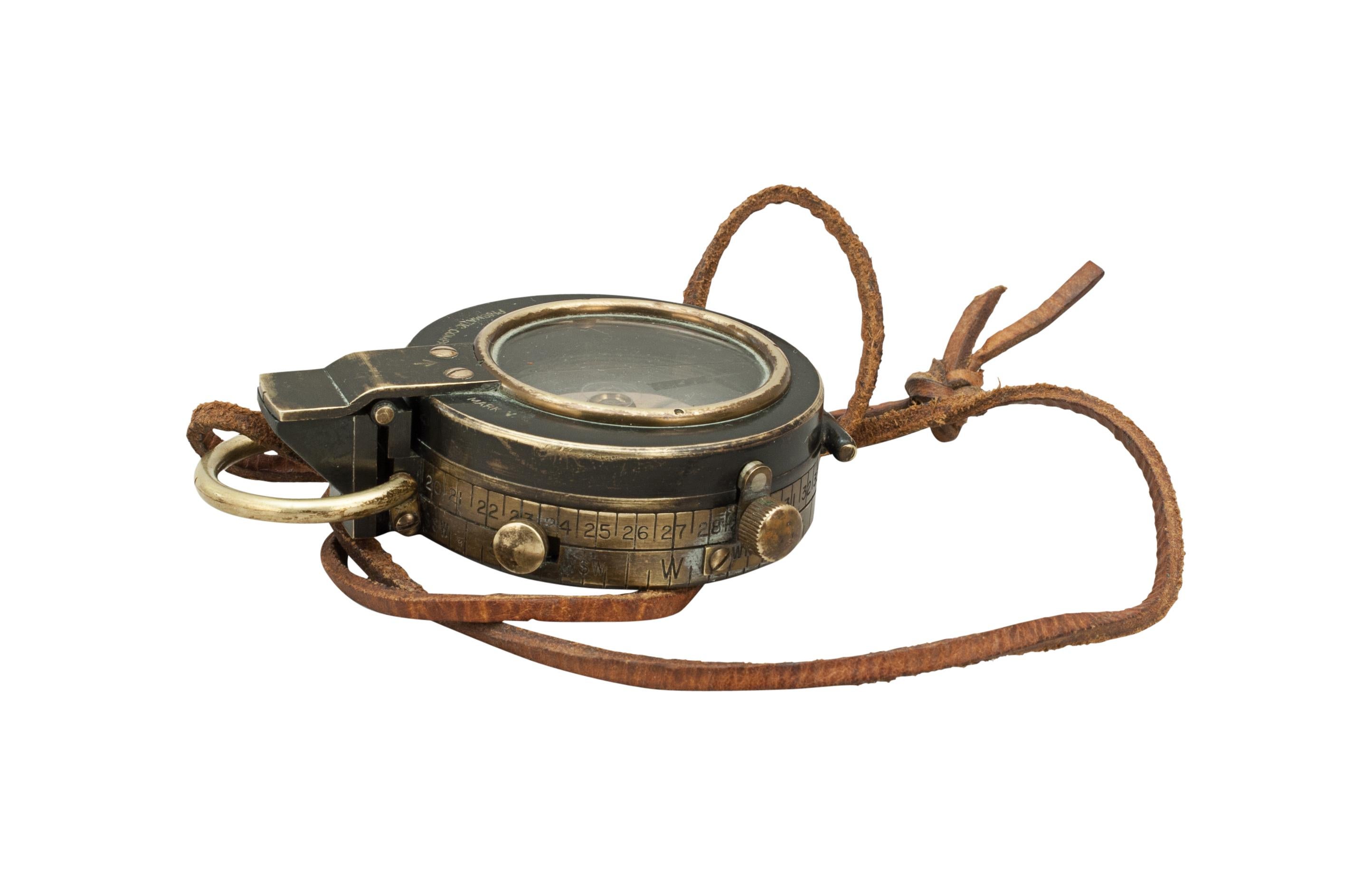 Short & Mason Ltd. Prismatic Mk. V Compass
Military Mk. V Prismatic Compass by Short & Mason Ltd.
The compass has a brass body and lid with original black finish, the glass lid having a sighting hairline and the lid lifting tab with aiming notch.
