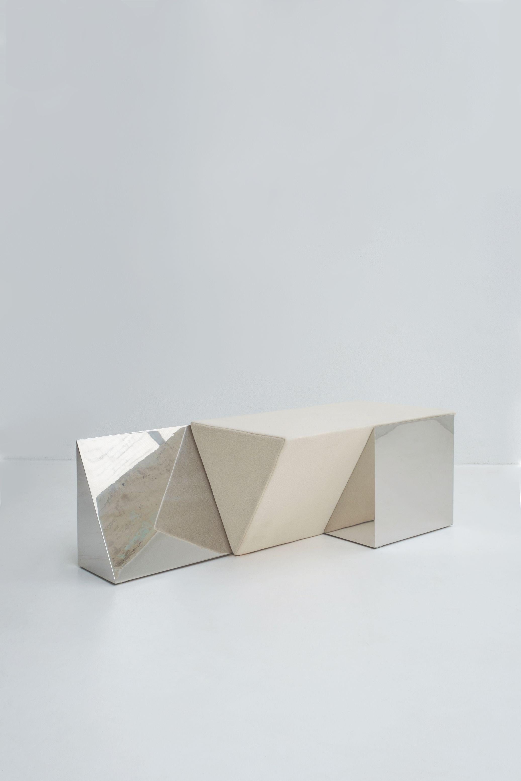 Miljevina bench by Nortstudio
Dimensions: 40 x 120 x 46 cm
Materials: Mirror polished steel, mirror-look HPL.


Three abandoned buildings with a strong geometrical character were the inspiration behind a new collection of sculptural