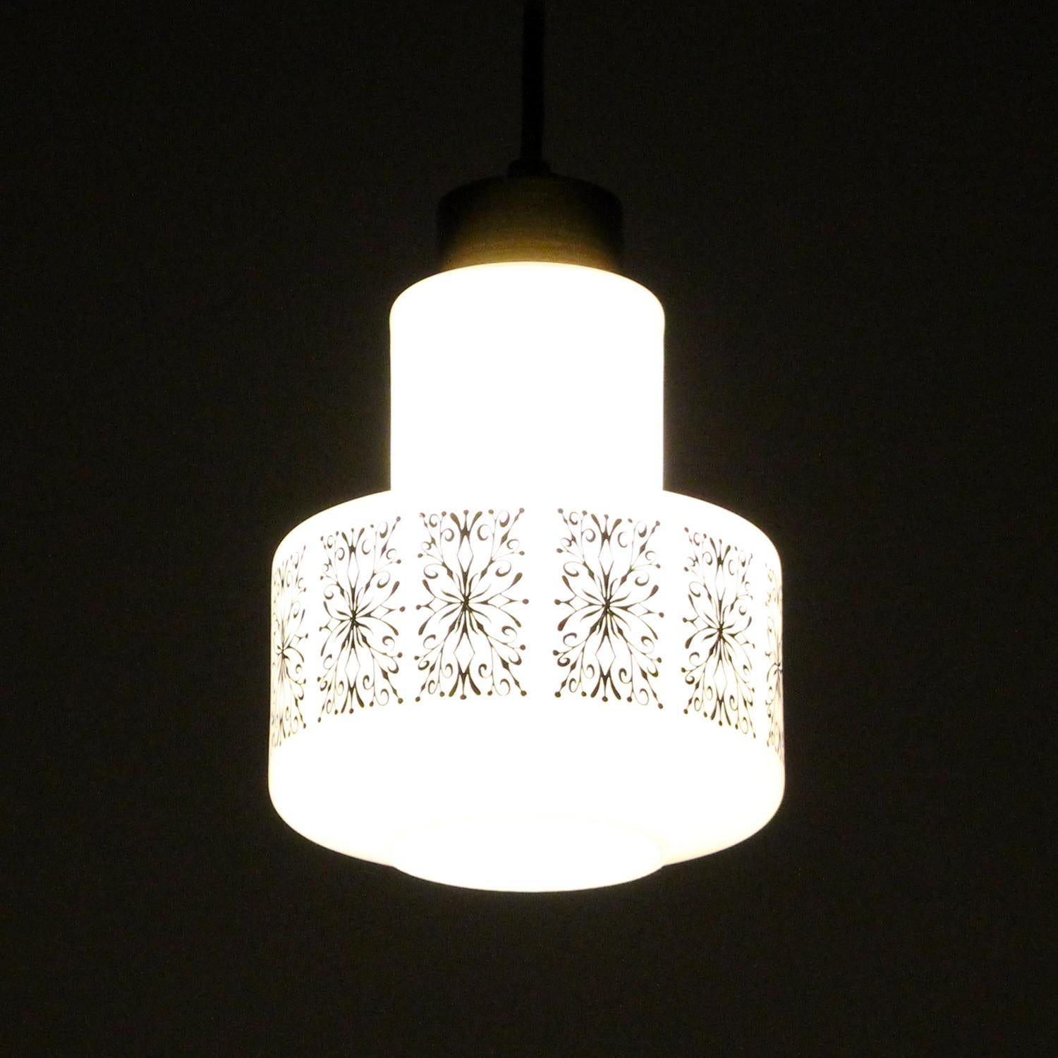 Lacquered MILK GLASS pendant light with black decoration by Scandinavian producer, 1950s For Sale