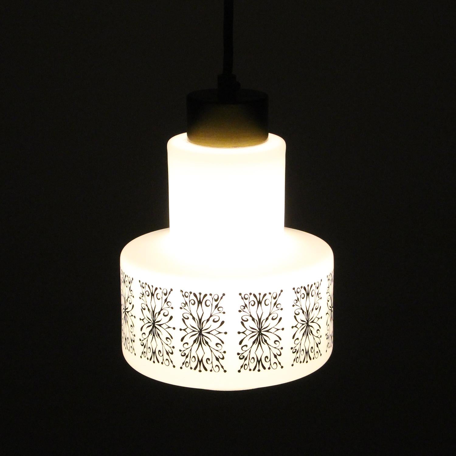 Mid-20th Century MILK GLASS pendant light with black decoration by Scandinavian producer, 1950s For Sale