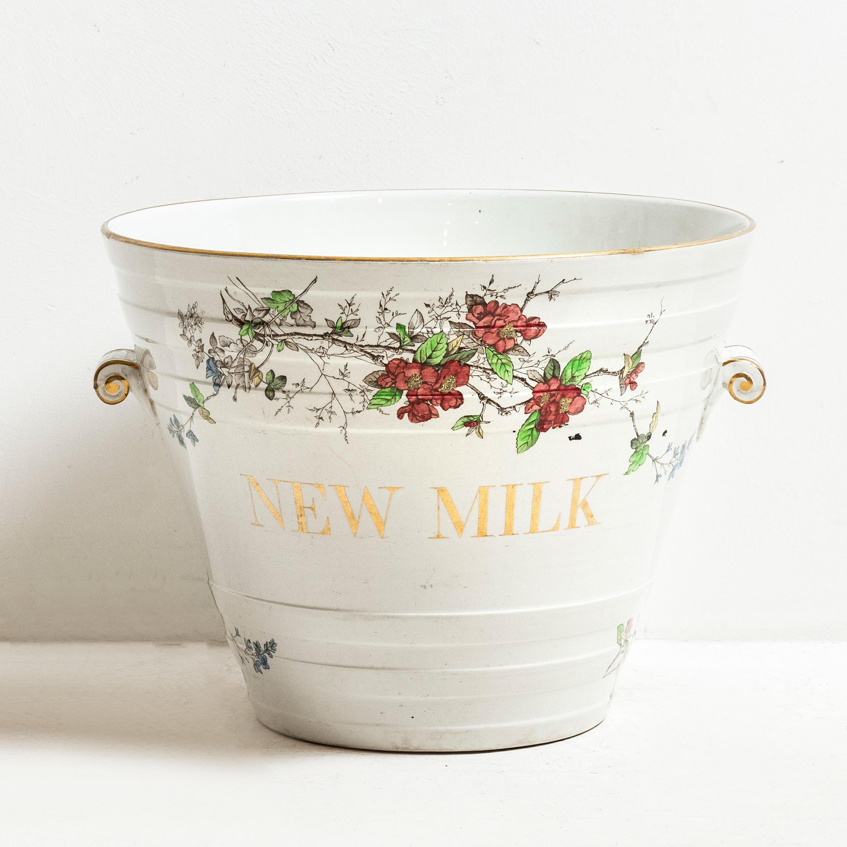 Ref: 126618
Pure Milk Pail. With gilt lettering and floral design.
England circa 1890

Measurements: H: 31cm (12.2