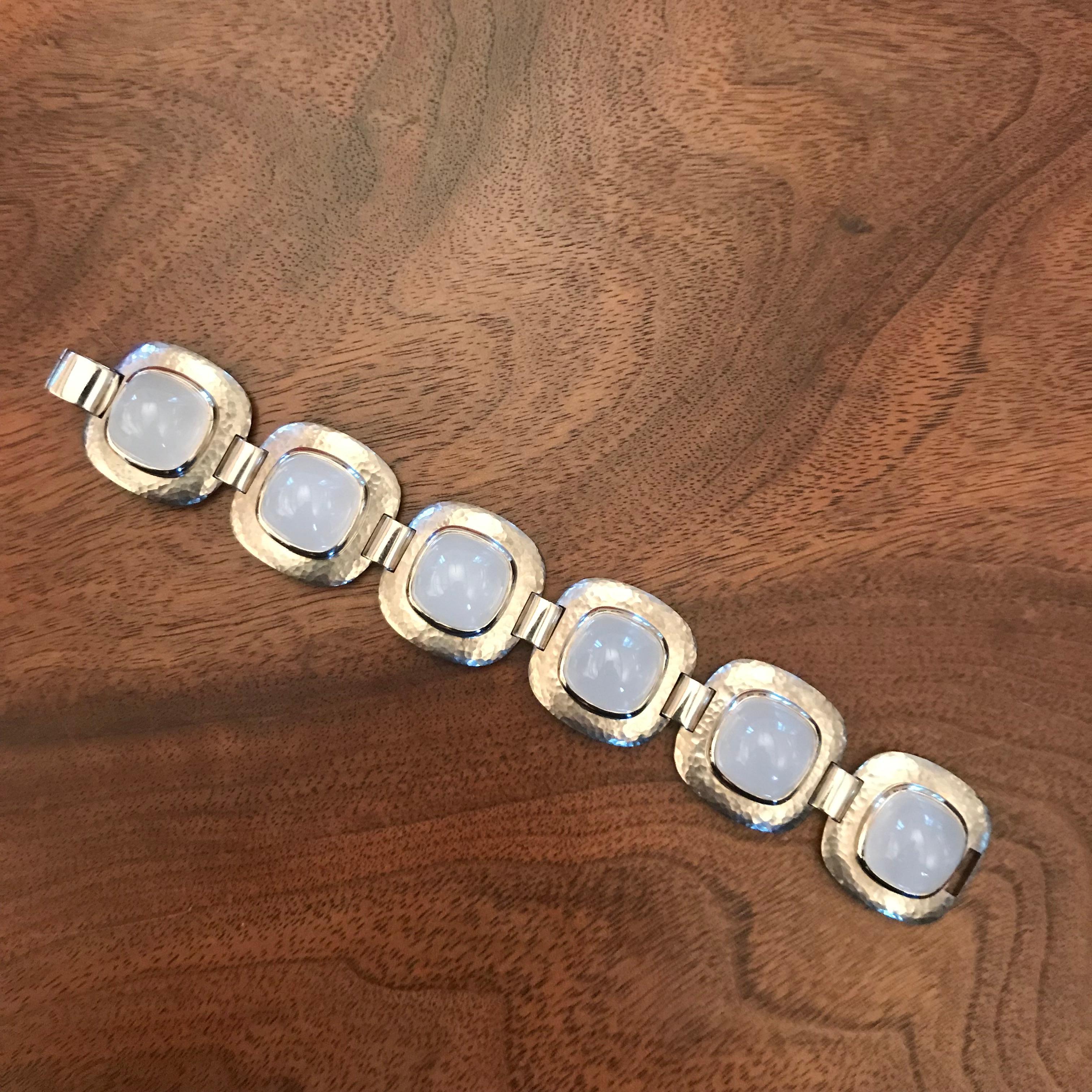 Statement bracelet in 18 carat hammered white gold with 6 milky quartz 113.1 ct in all.