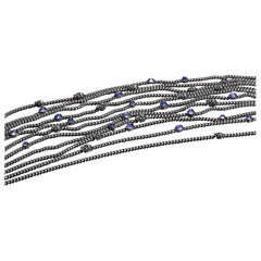 Milky Way Necklace — Curb Link Chains with Cabochon Tanzanites and Skull Details