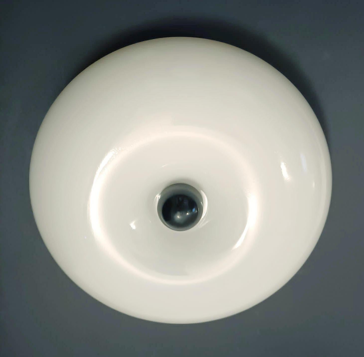 Vintage Italian flush mount or wall light with a single milky white Murano glass shade / Made in Italy by Vistosi, circa 1960s
Measures: diameter 14 inches, height 4 inches
3 lights / E12 or E14 type / max 40W each
2 available in stock in Italy,
