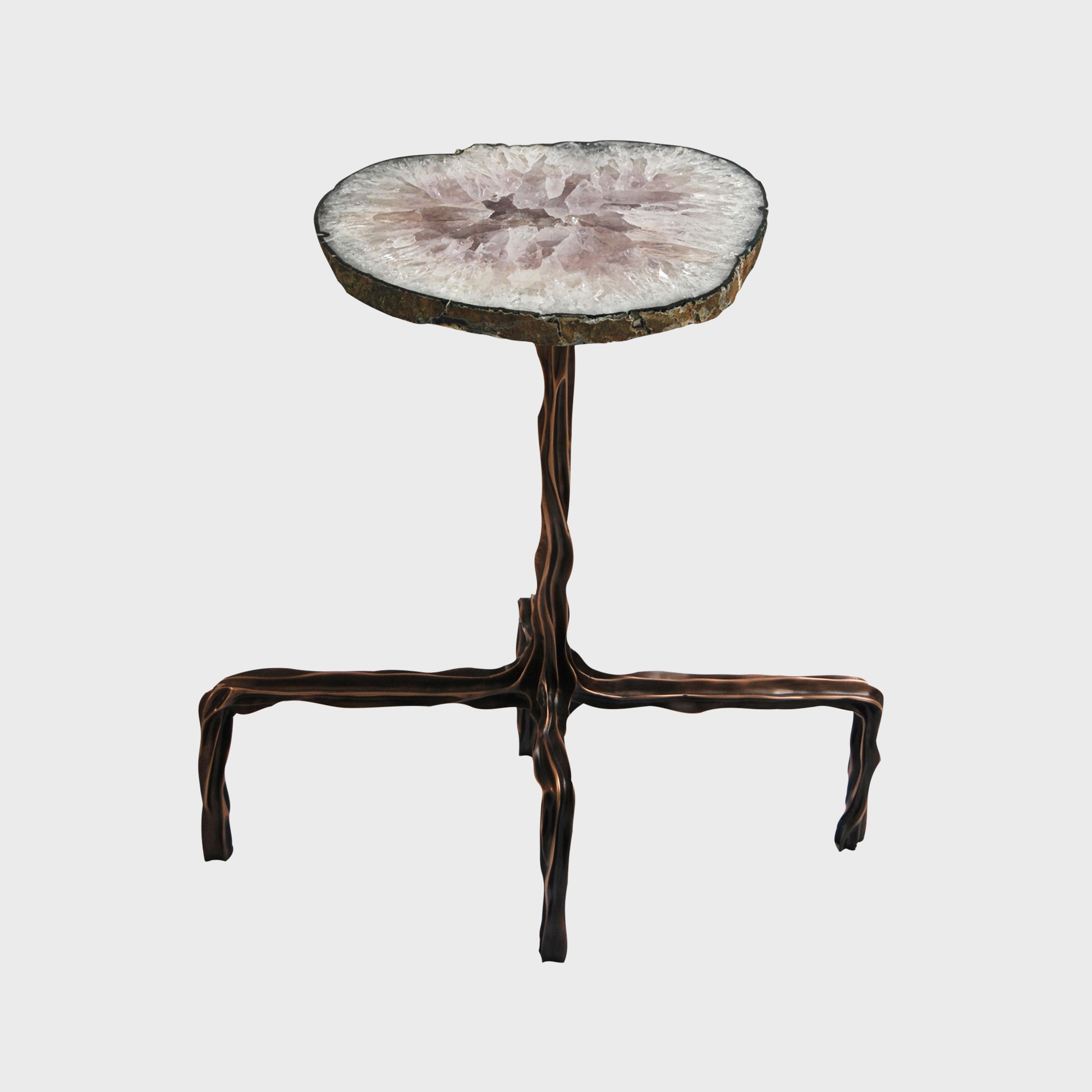 Cast in bronze from the artist's hand molded form, each Milla coctail table is made to order and hand finished. Stone tabletop finish options are available. Design by Fakasaka.