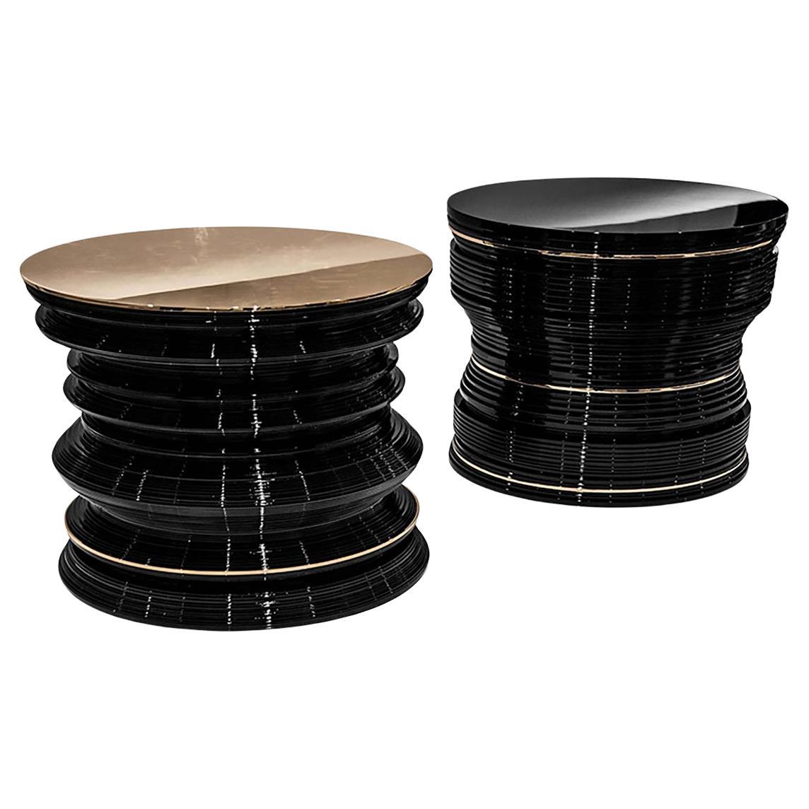 Architecturally designed to showcase its striated surface and fluid structure, the Mille 1 and 2 feature high gloss black lacquer with an elegant finish and lustrous bronze details.

Pictured with a black lacquer top and a striated structure