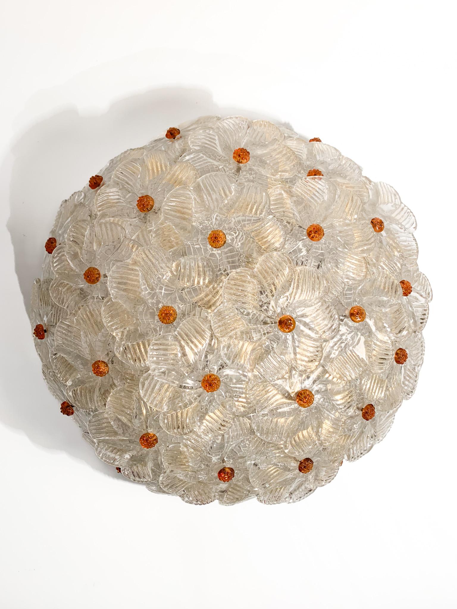Millefiori ceiling light in golden Murano glass, with two lights, made by Barovier & Toso in the 1950s

Ø cm 36 h cm 16

Barovier & Toso is a glass factory, known for its handcrafted collections of decorative Murano glass in the 20th century. The