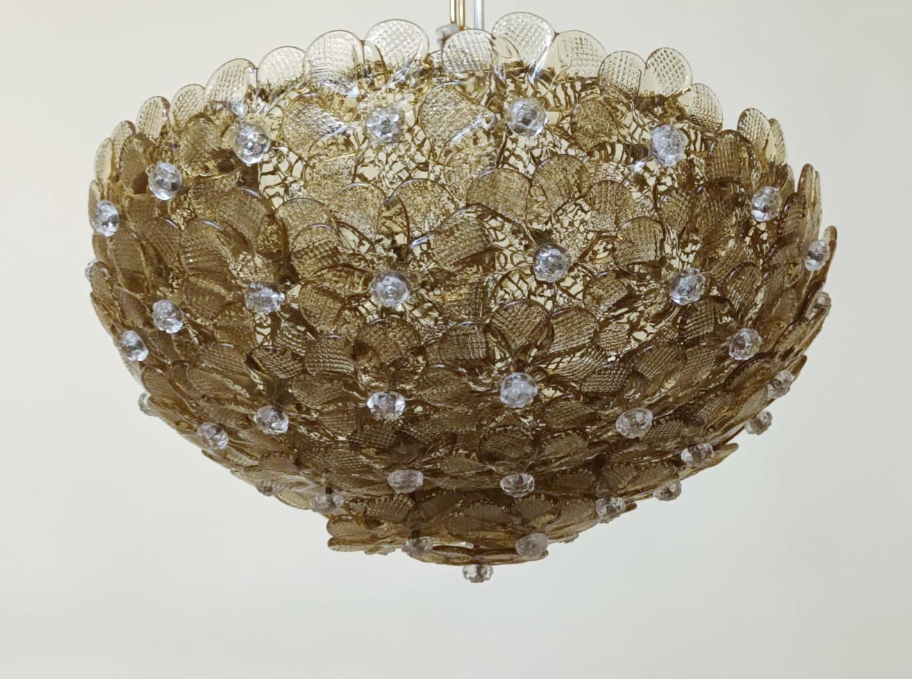 Vintage Italian flush mount with smoky hand blown Murano glass flowers / Made in Italy in the 1960s by Barovier e Toso
2 lights / E12 or E14 type / max 40W each
Measures: Diameter 13 inches / height 6 inches
1 available in stock in Italy
Order
