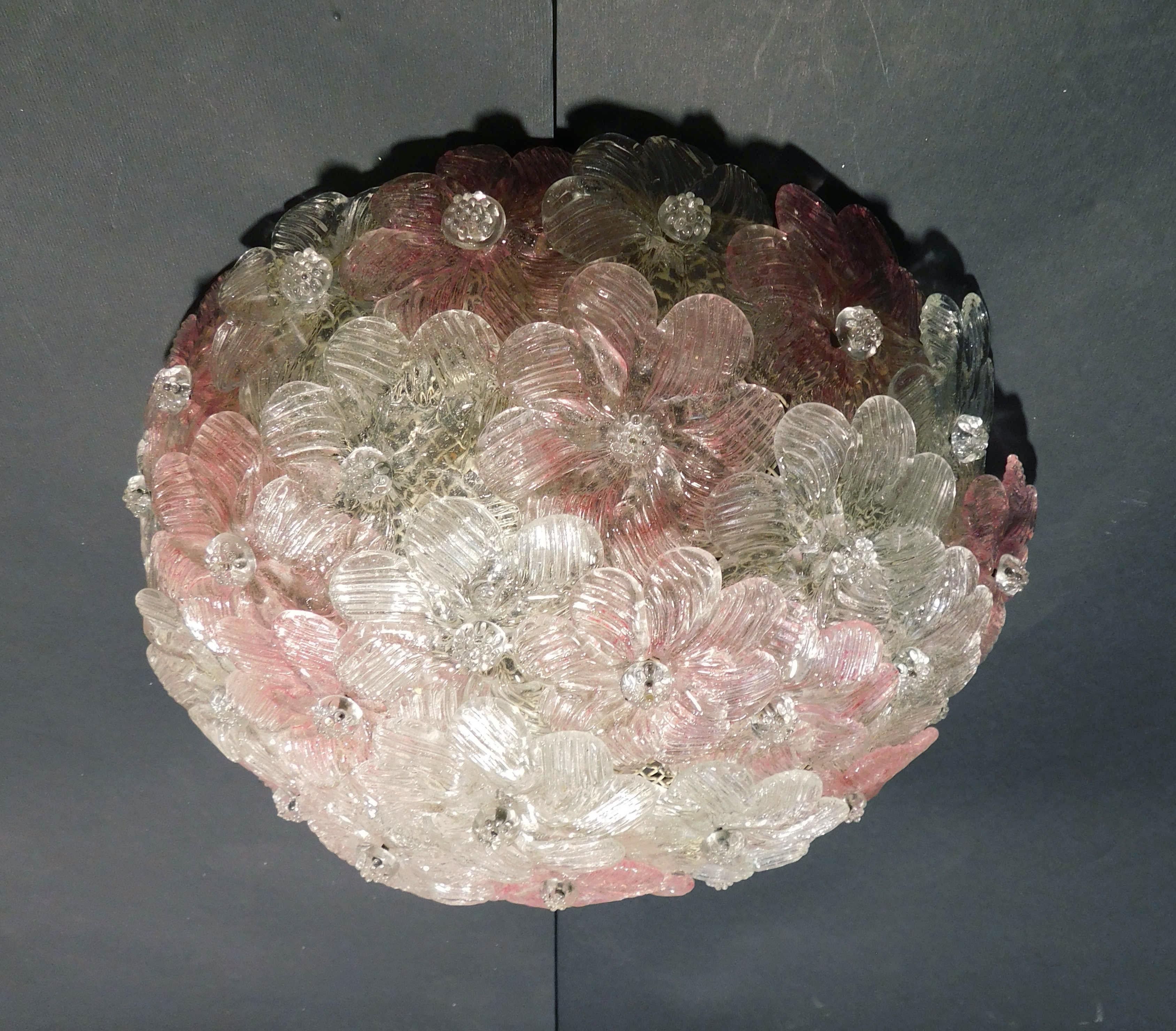 Vintage Italian flush mount with clear and pink hand blown Murano glass flowers / Made in Italy in the 1960s in the style of Barovier e Toso
2 lights / E12 or E14 type / max 40W each
Measures: Diameter 12 inches / height 5 inches
2 available in