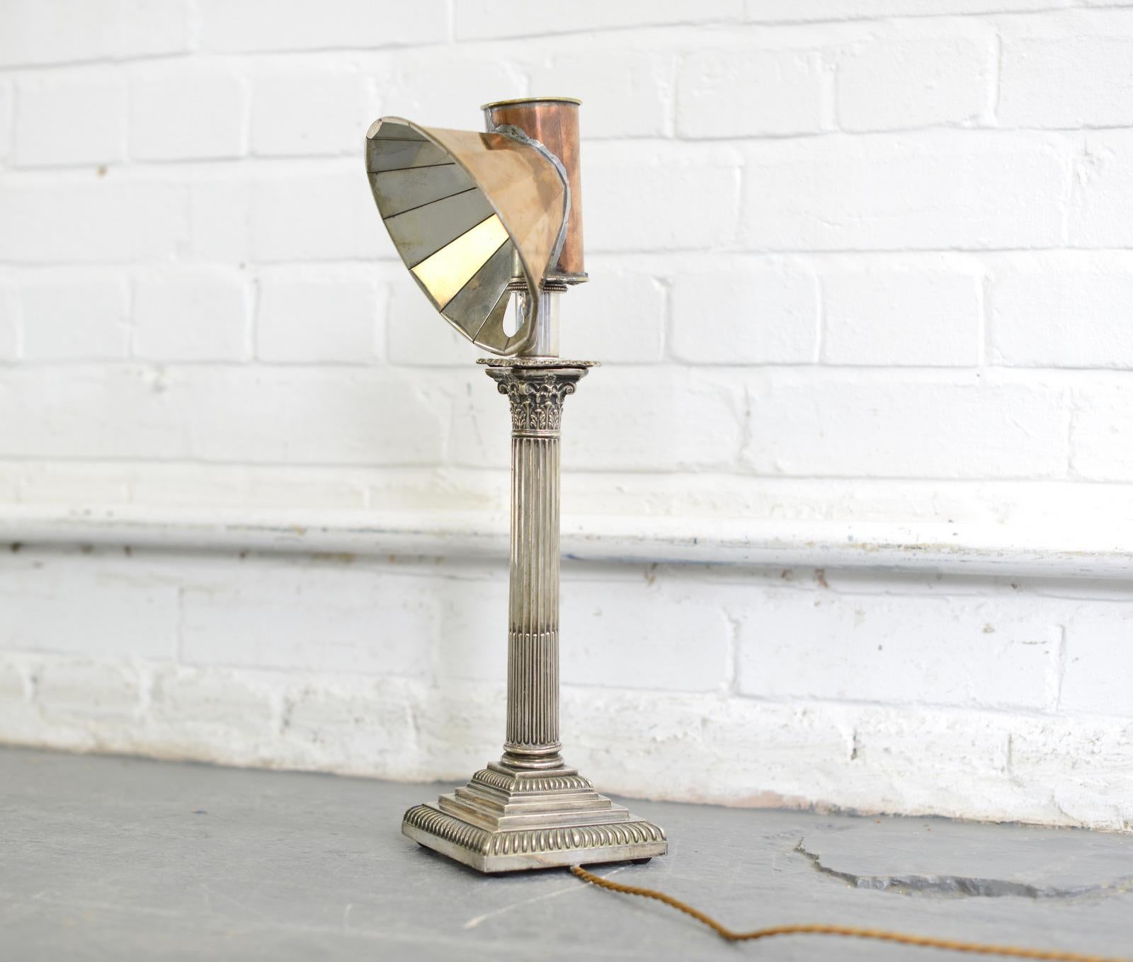 Miller's of London reading lamp, circa 1880

- Brass shade with polished silver reflector
- Silver plated 
- Shade turns to direct the light
- Takes E14 bulbs
- Made by Miller & Sons, Piccadilly, London
- English, 1880
- 47cm tall x 12cm