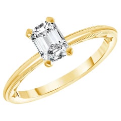 Anillo de compromiso solitario de oro amarillo de 18 quilates Millgrain