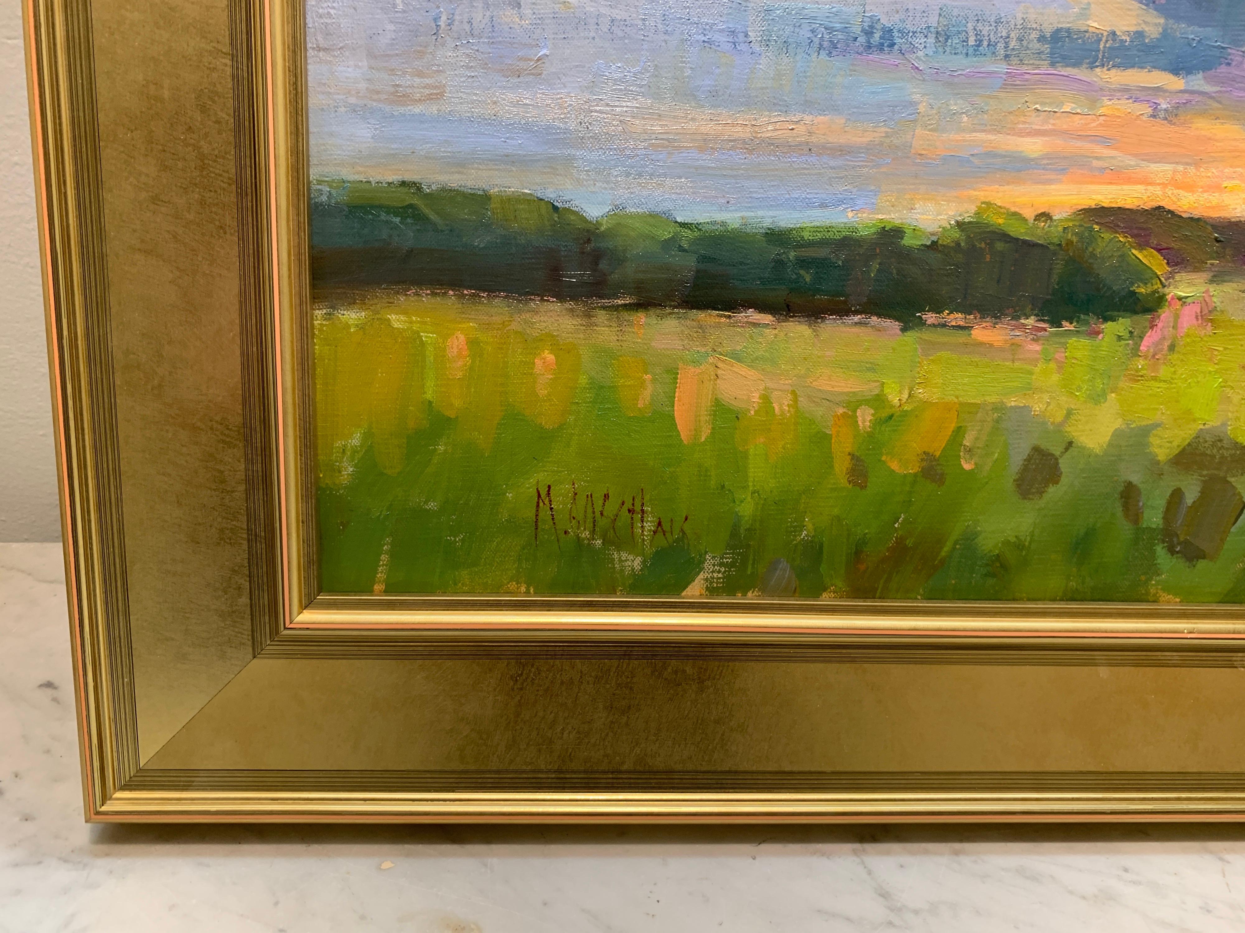 'After A Storm' is a framed Impressionist plein air landscape painting created by American artist Millie Gosch in 2021. Featuring a rich palette mostly made of blue, green, pink and orange tones, this oil on canvas painting depicts an exquisite