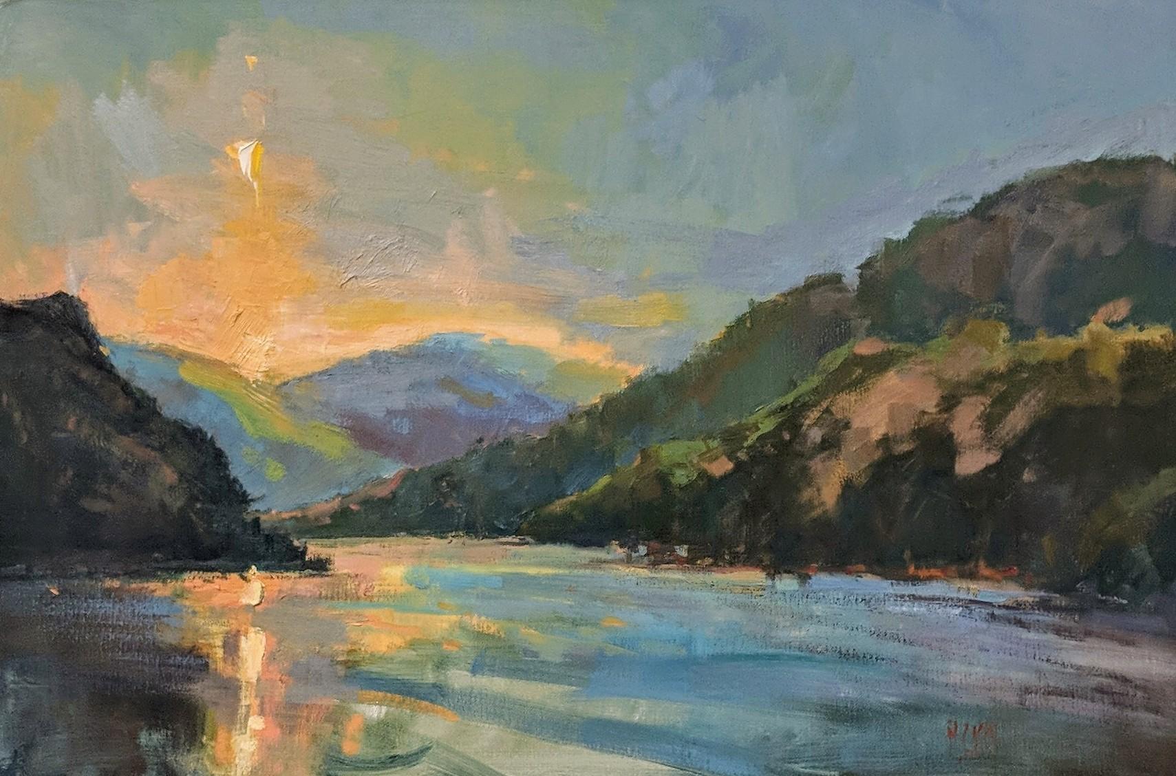 'Lakeside Sundown' is a framed Impressionist oil on canvas plein-air painting of horizontal format, created by American artist Millie Gosch in 2019. Featuring a palette mostly made of blue, orange, green and yellow tones, the painting depicts an
