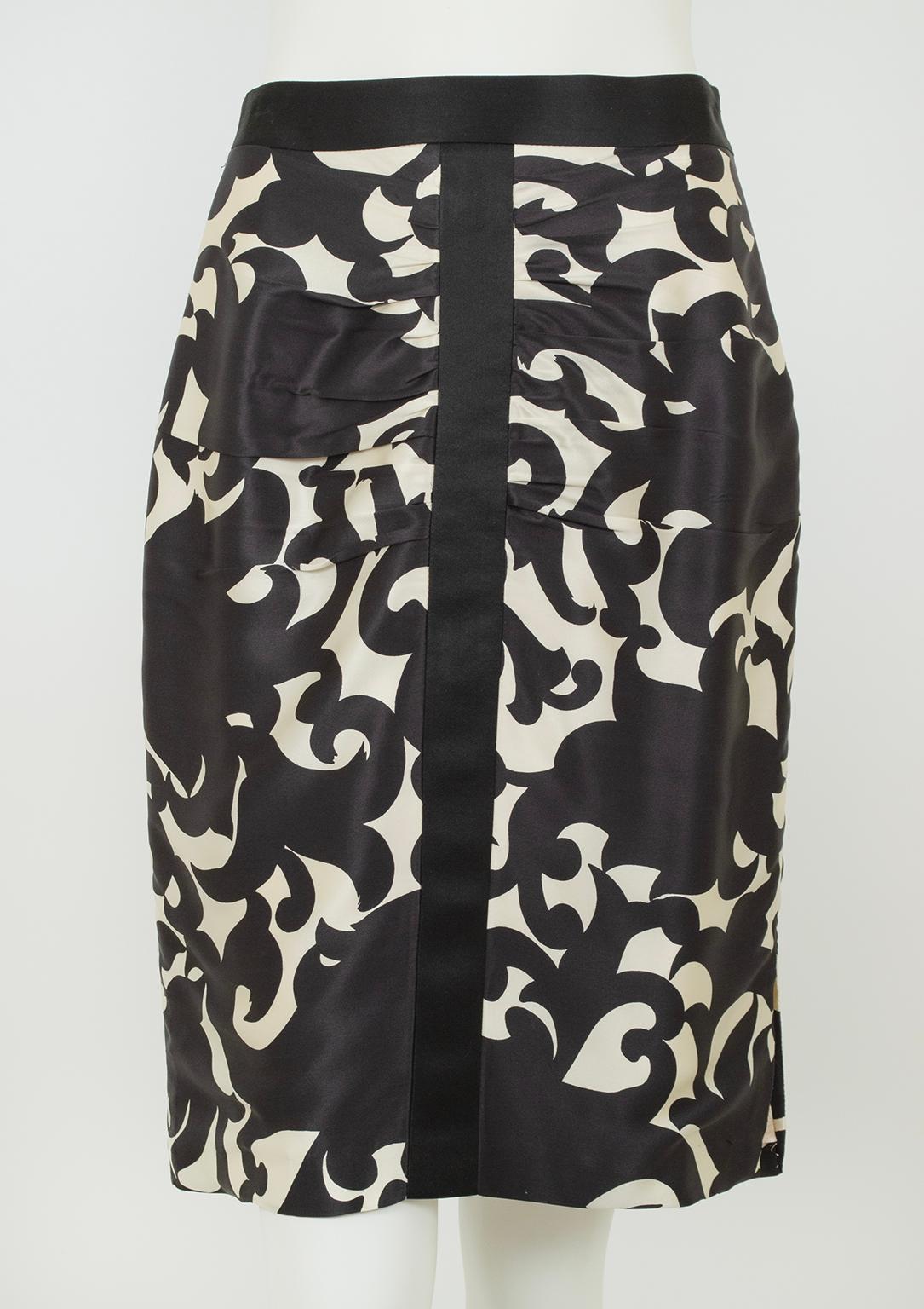 As good with a silk blouse as it with a leather jacket, this feminine skirt brings the heat thanks to strategic ruching across the derrière. And though the colors appear black and ivory, the print itself is actually deep navy punctuated by a black