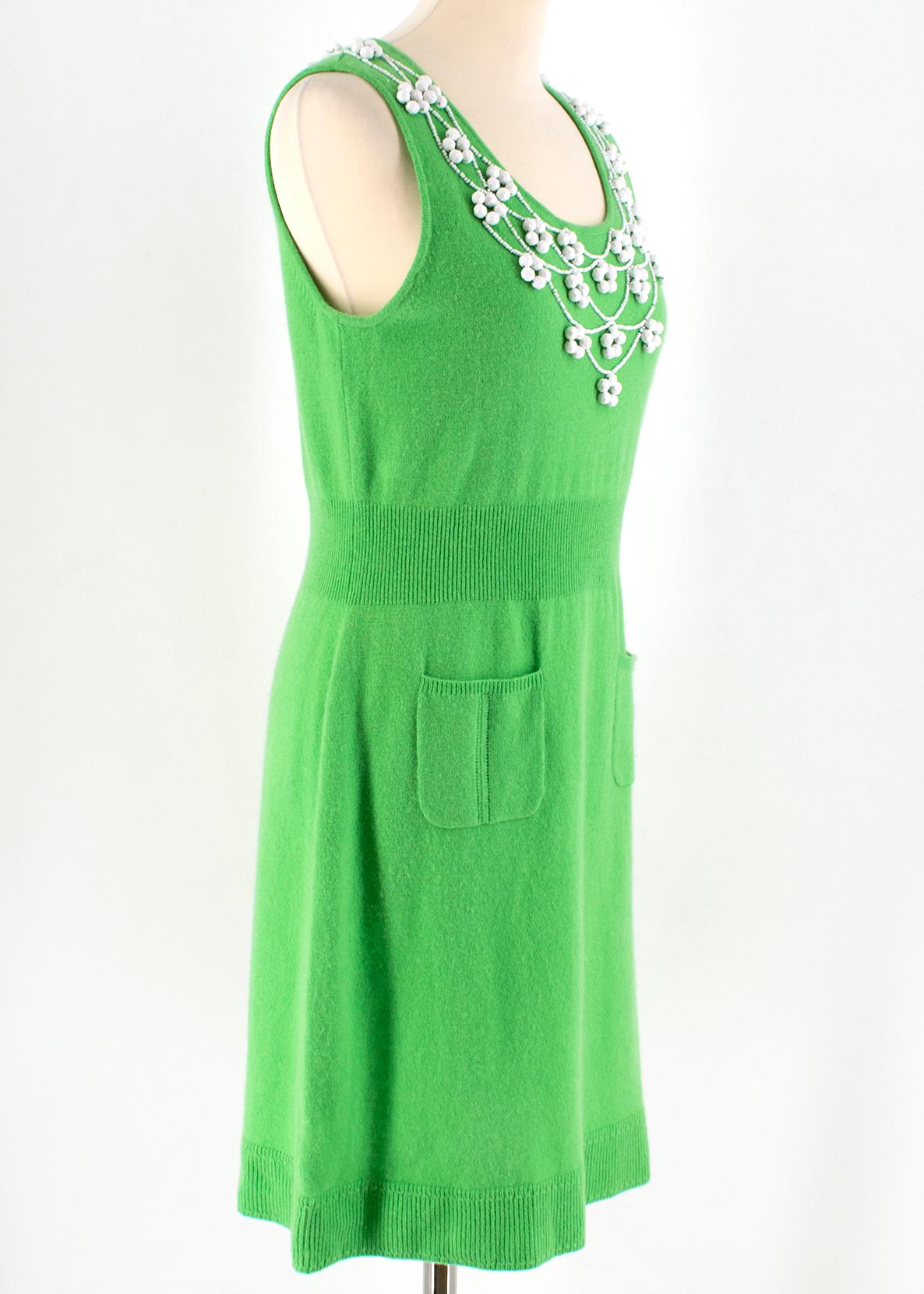 Milly Green Cashmere Embellished Dress

- green cashmere dress
- sleeveless
- round neckline 
- white bead embellished to the neckline 
- ribbed waist and trim 
- two front slip pockets 
- pull on  

Please note, these items are pre-owned and may
