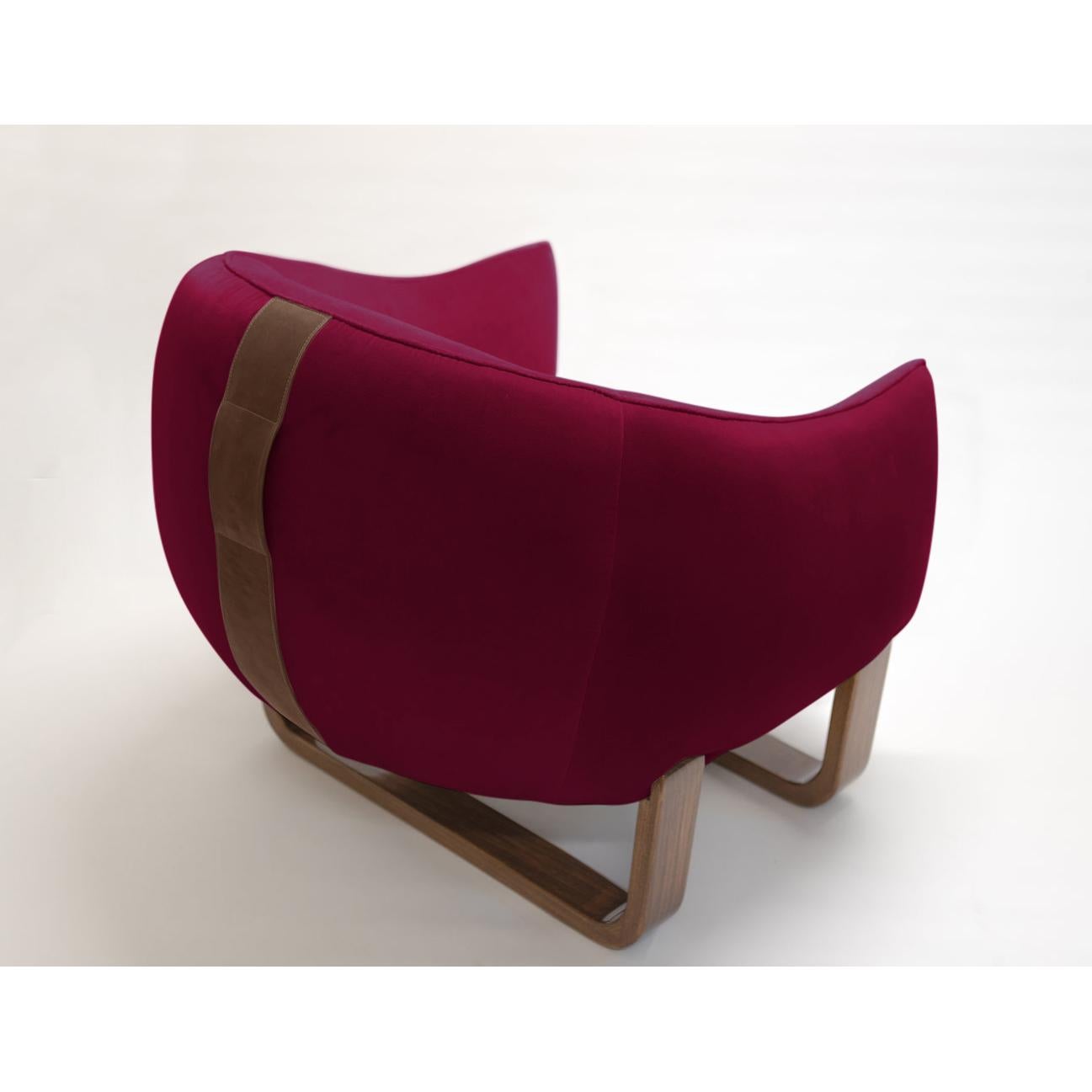 The Milo armchair features twin bentwood bases and legs in luxurious lacquer and varnished finishes, while The Milo Bean has leather accent handles for easy carrying?. The colorful, curvy duo designed by Marie Burgos can be used together with The