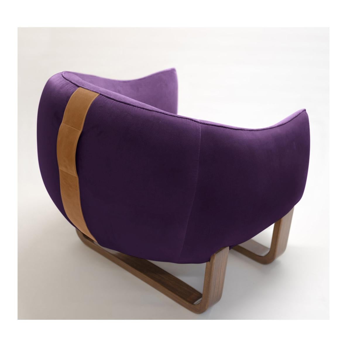 The Milo armchair features twin bentwood bases and legs in luxurious lacquer and varnished finishes, while The Milo Bean has leather accent handles for easy carrying?. The colorful, curvy duo designed by Marie Burgos can be used together with The