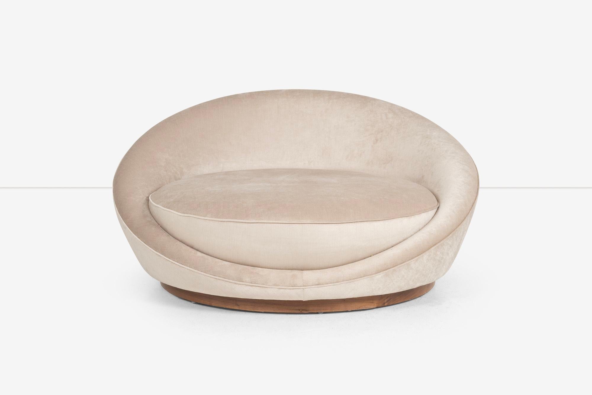 Milo Baufmanm Satellite Chaise, upholstered with cotton velvet, base walnut veneer.

Dimensions:
29