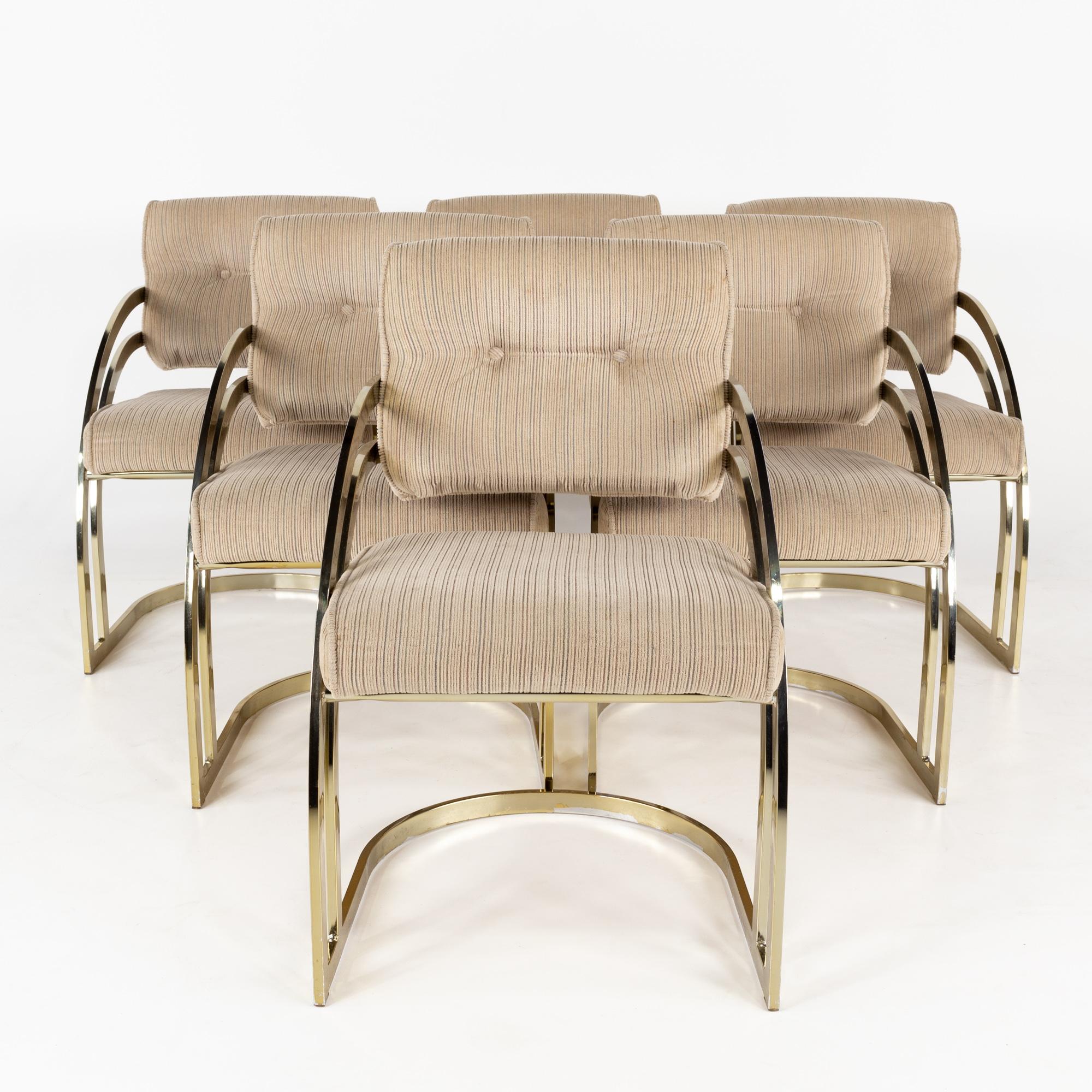 Milo Baughan style mid century brass Cantilever dining chairs - Set of 6

Each chair measures: 20 wide x 27 deep x 33 inches high, with a seat height of 19 and arm height of 25 inches

All pieces of furniture can be had in what we call restored