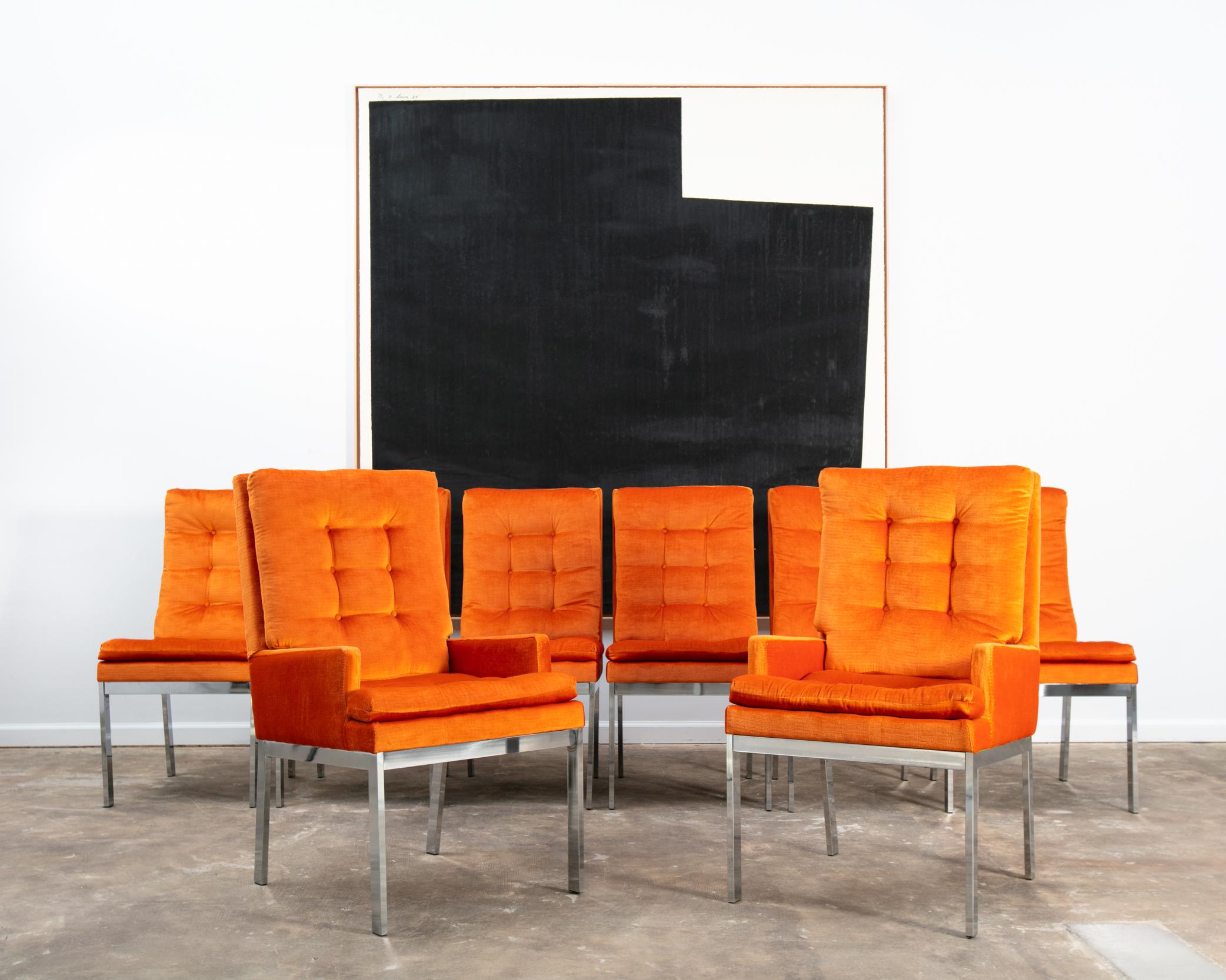 A set of 8 Midcentury orange velvet upholstered dining chairs with chrome legs designed by Milo Baughman.