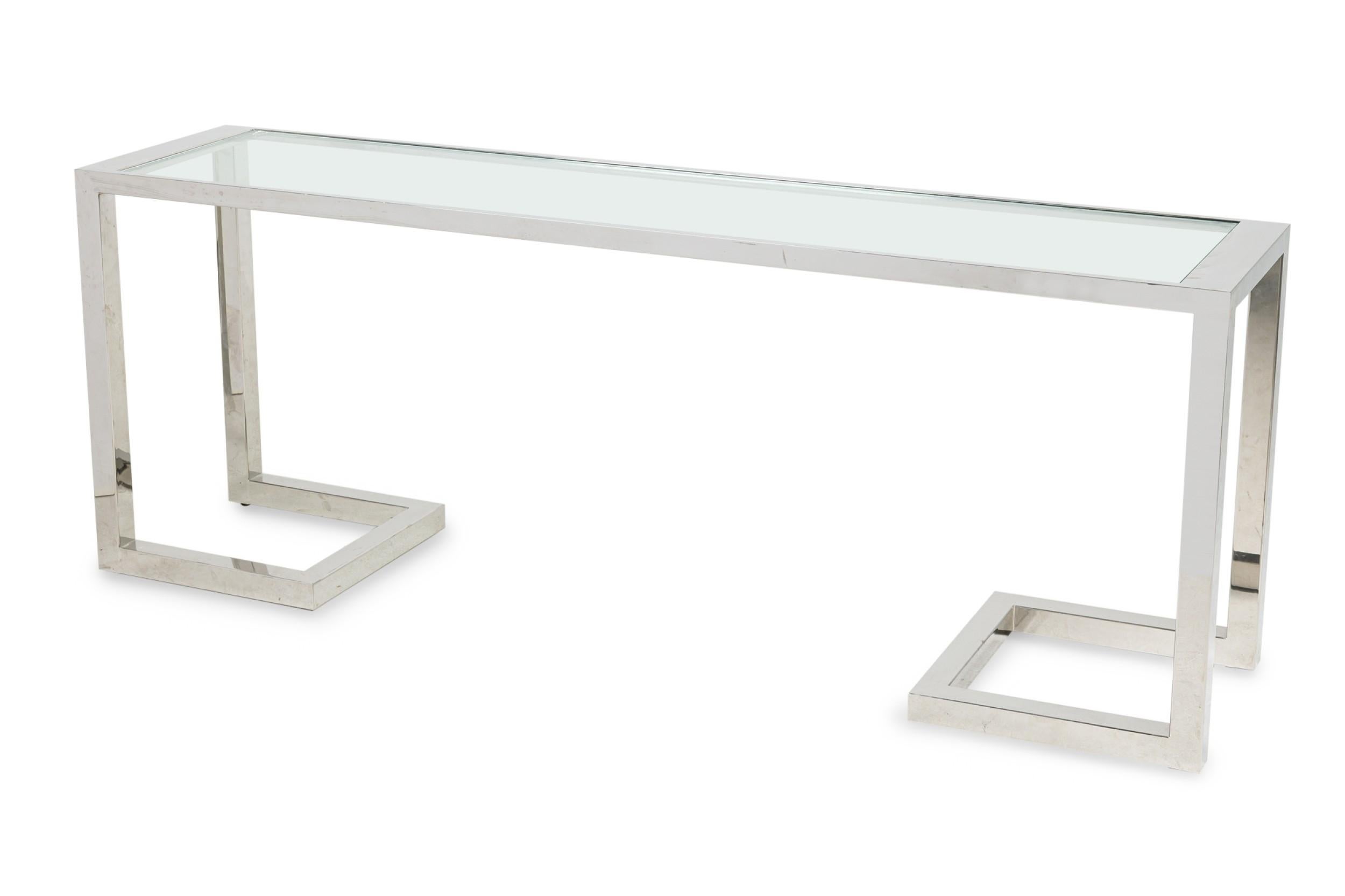 American Mid-Century Modern console table with an open polished chrome bracket form frame and having an inset glass top. (MILO BAUGHMAN)
 

 Condition Notes: