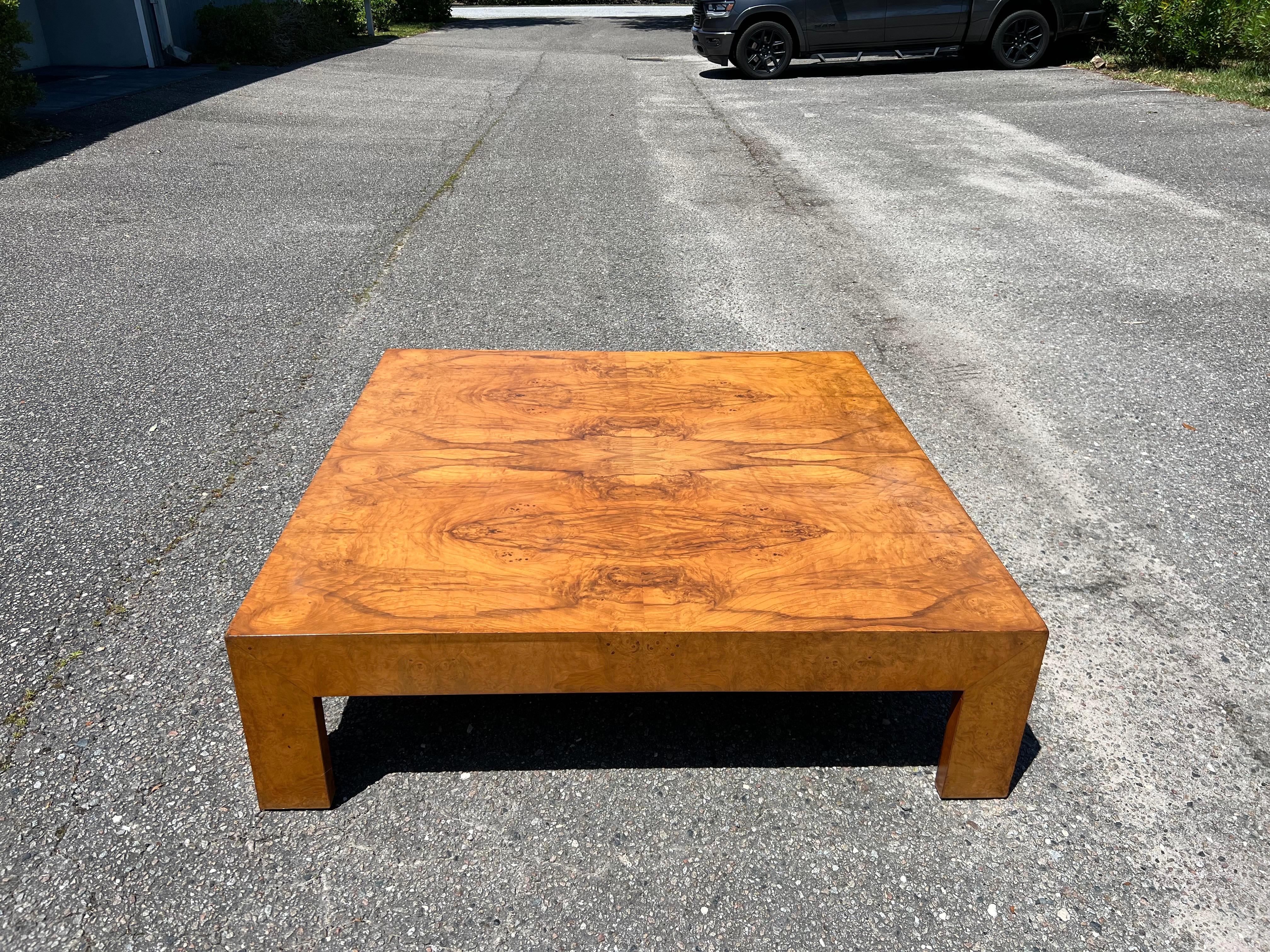 Large scale burl wood coffee table, designed by Milo Baughman for Thayer Coggin, American, circa 1960s. This large-scale table was made for entertaining and the burled wood graining is beautiful. It measures an impressive 54