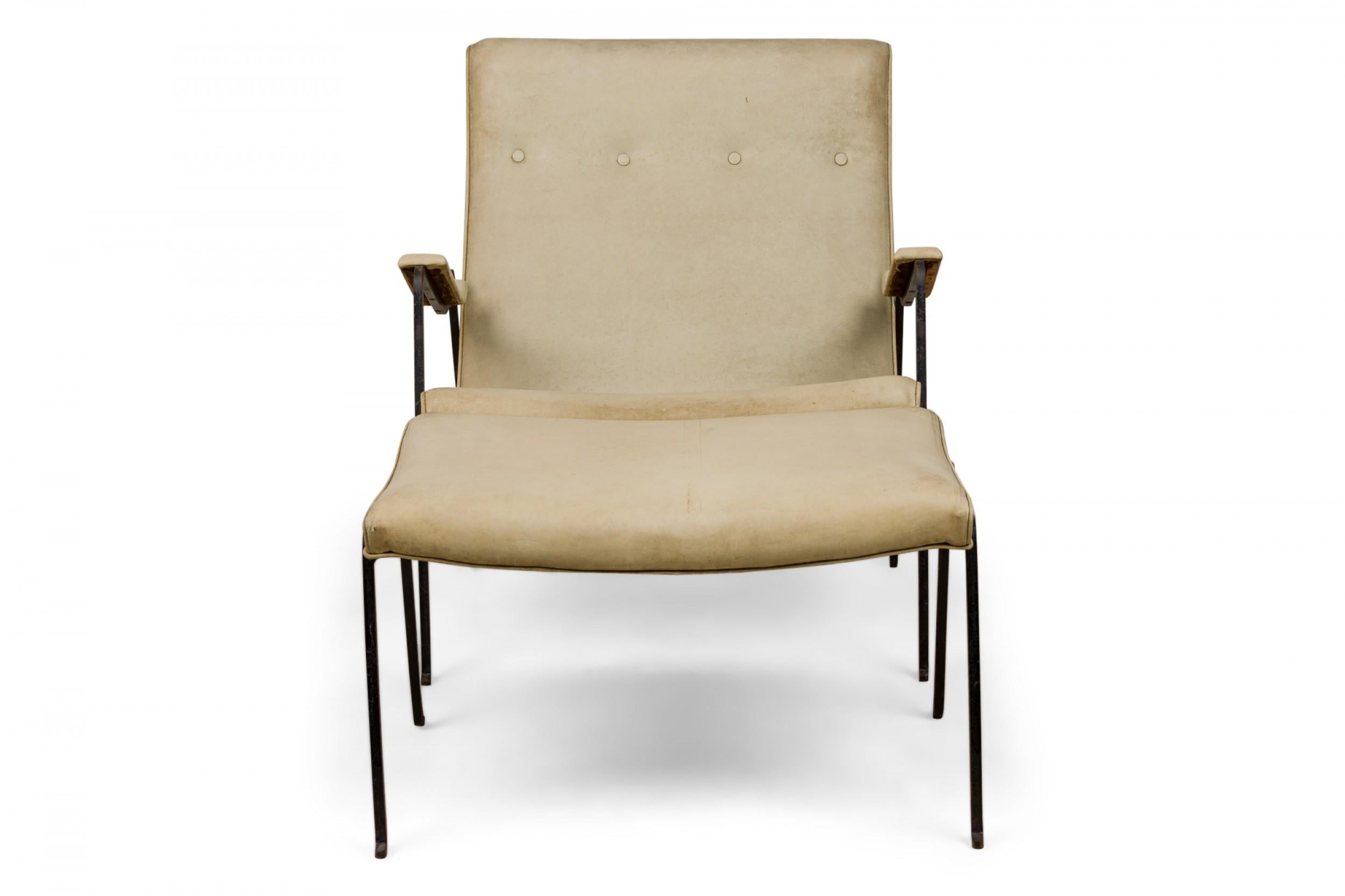 American Mid-Century armchair and ottoman set with beige leather button tufted upholstered seats, backs, and arms, with black wrought iron frames ending in slightly curved feet. (MILO BAUGHMAN)(PRICED AS SET)
