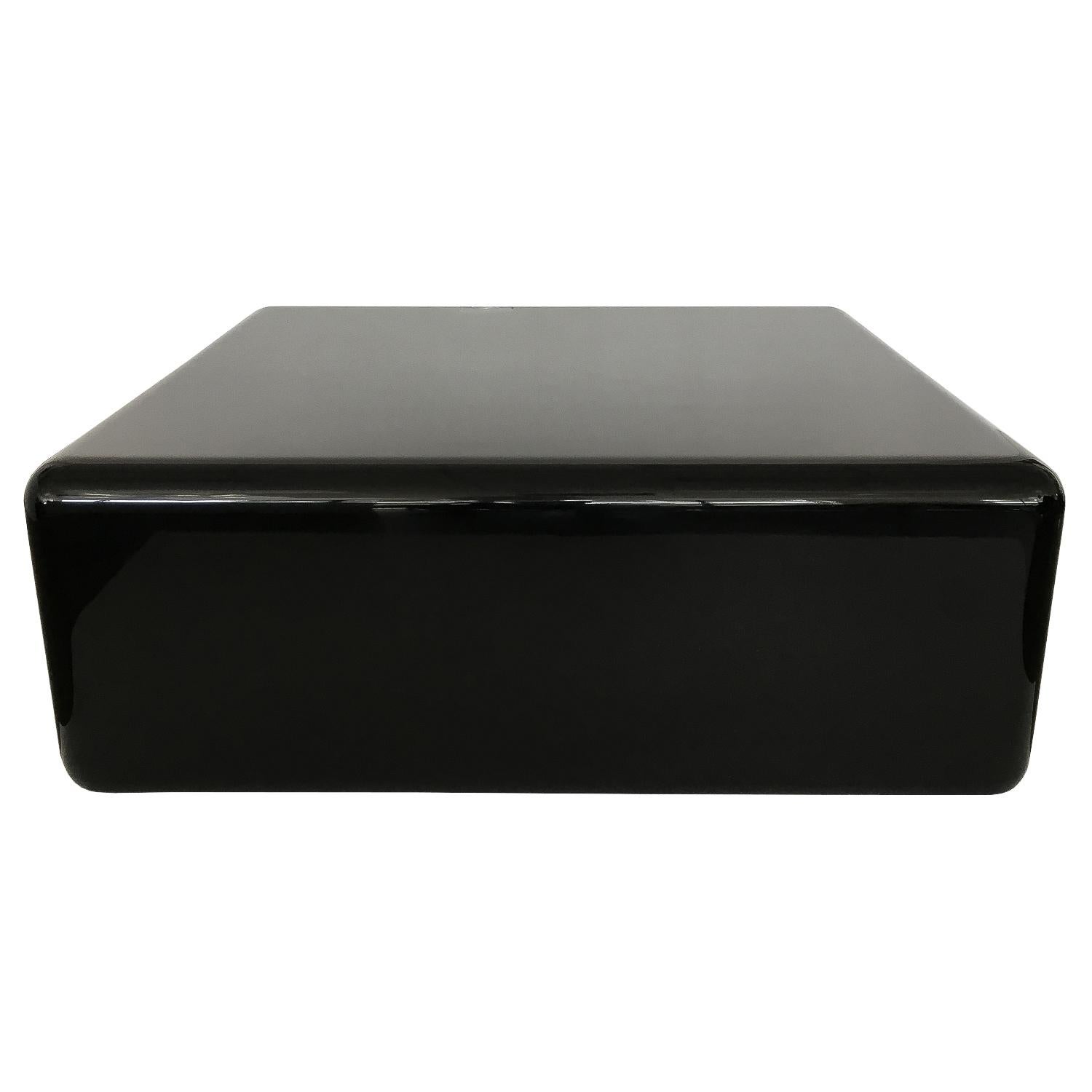 Gorgeous black gloss lacquered chiclet form coffee table designed by Milo Baughman for Thayer Coggin, circa 1970s. Square cocktail table with soft radius edges on all sides. High gloss finish. Monolithic and minimal in design. Thayer Coggin / Milo