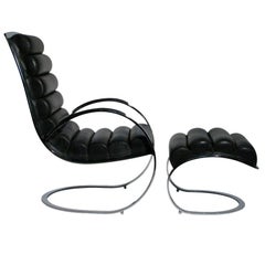 Black Leather and Chrome Lounge Chair and Ottoman