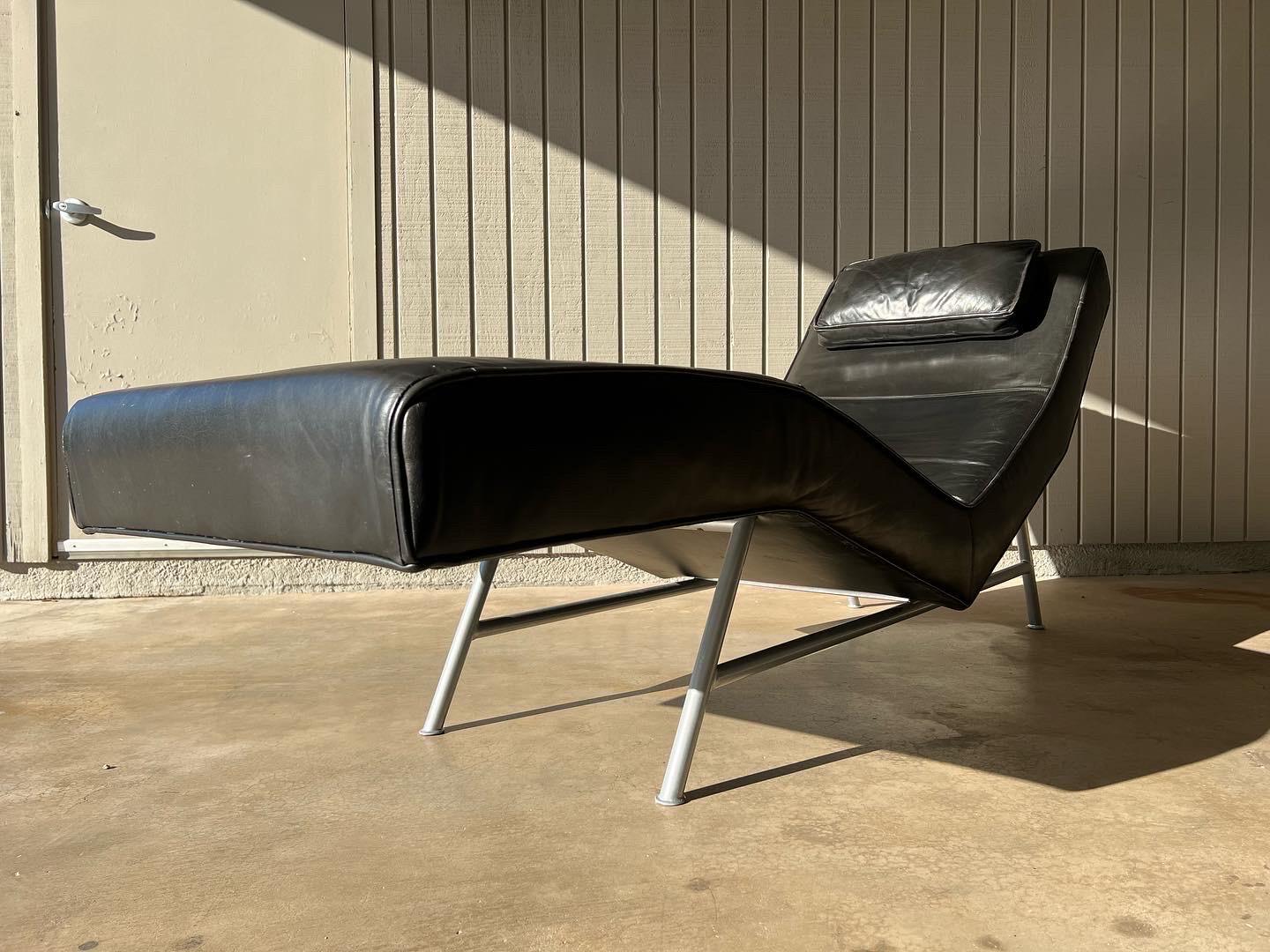Milo Baughman “Fred” chaise lounge chair for Thayer Coggin in black leather on a brushed stainless steel base. This was one of Milo Baughman’s initial design proposals to Thayer Coggin in 1953. It features a form fitting design with an attached
