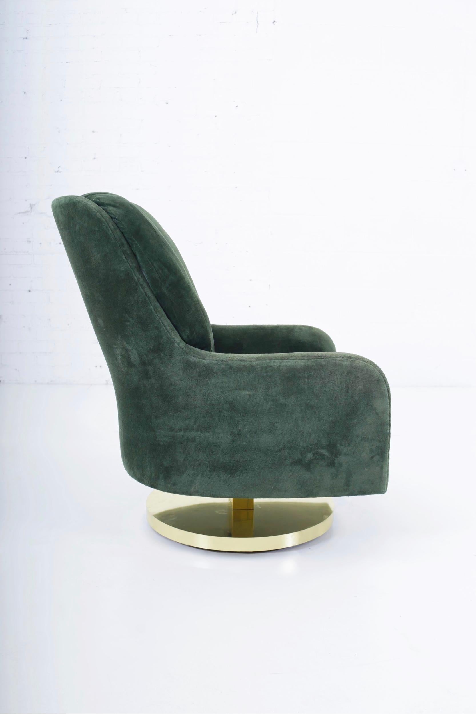 High back swivel chair with brass rocking base. Designed by Milo Baughman for Thayer-Coggin, circa 1970s.